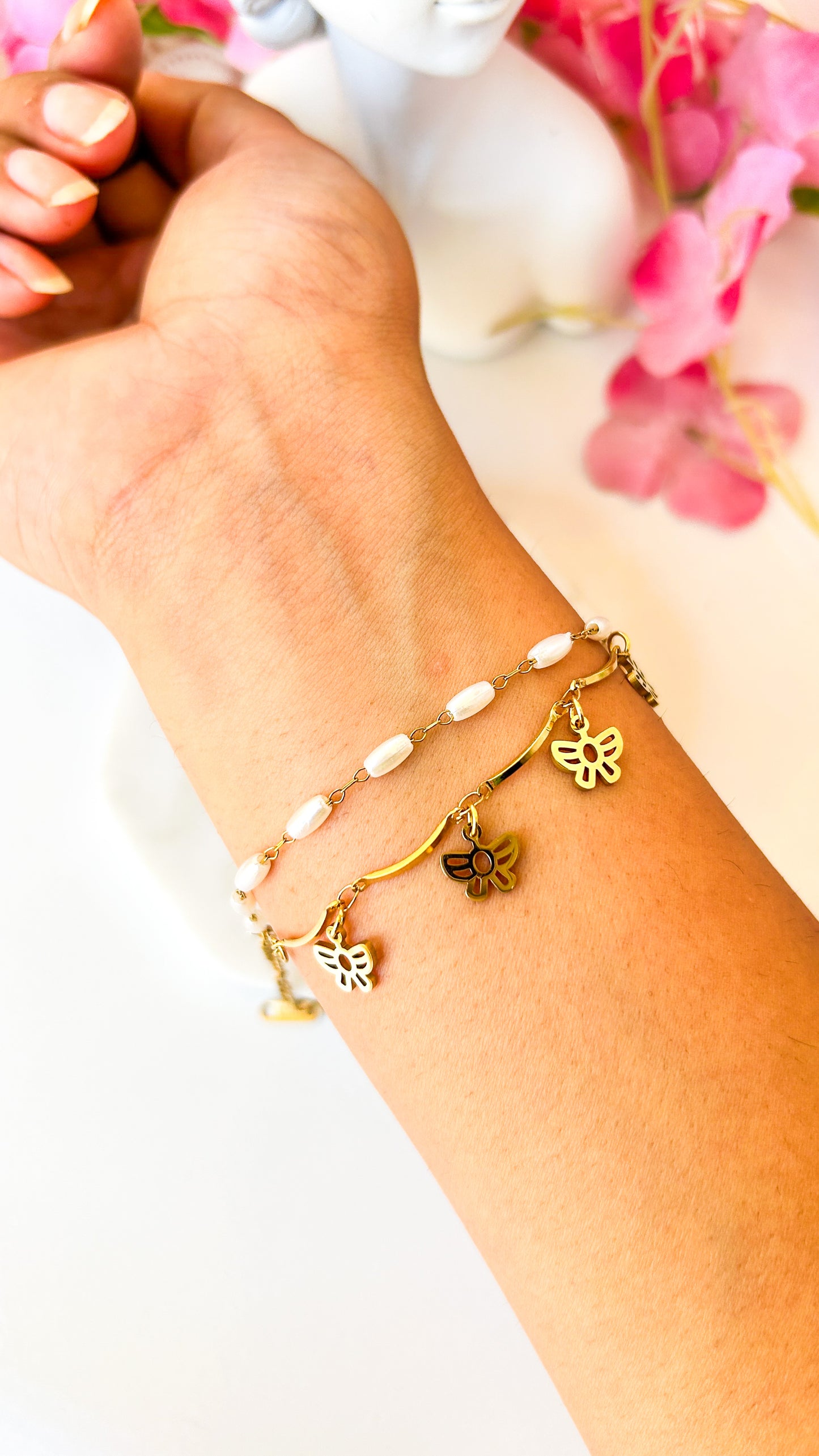 Pearl butterfly layered charm bracelet