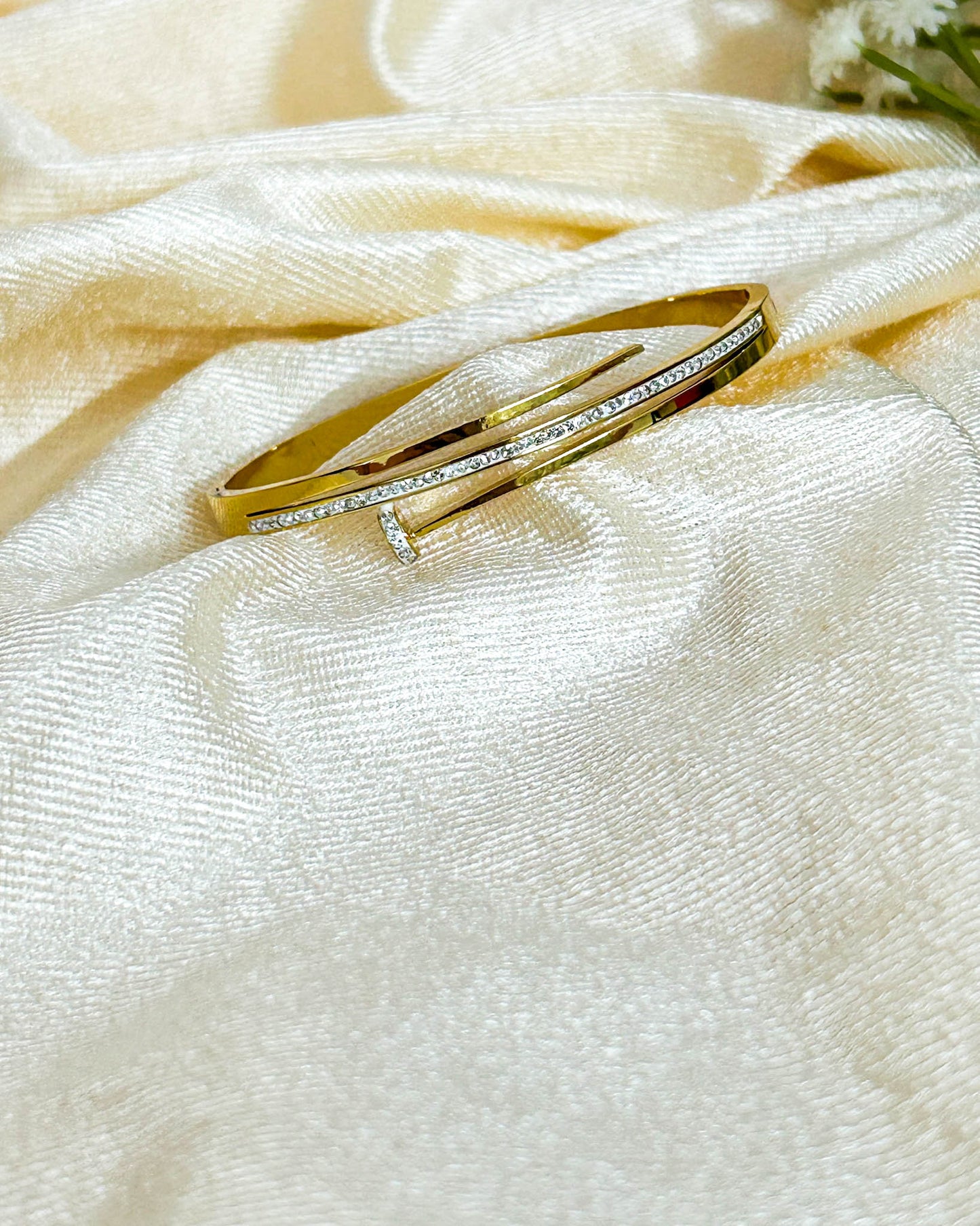 Thin studded nail bracelet
