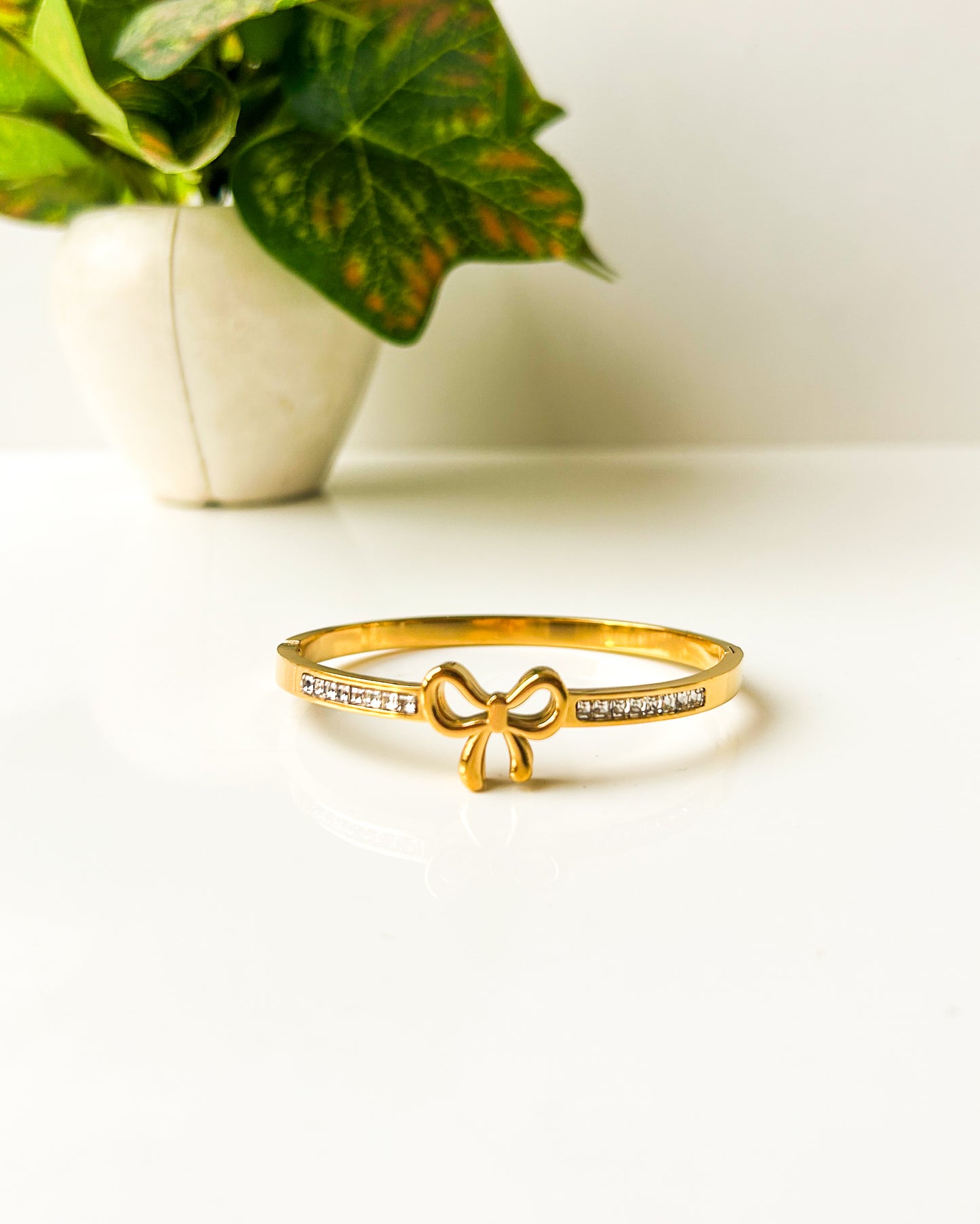 Studded bow thin wrist bracelet