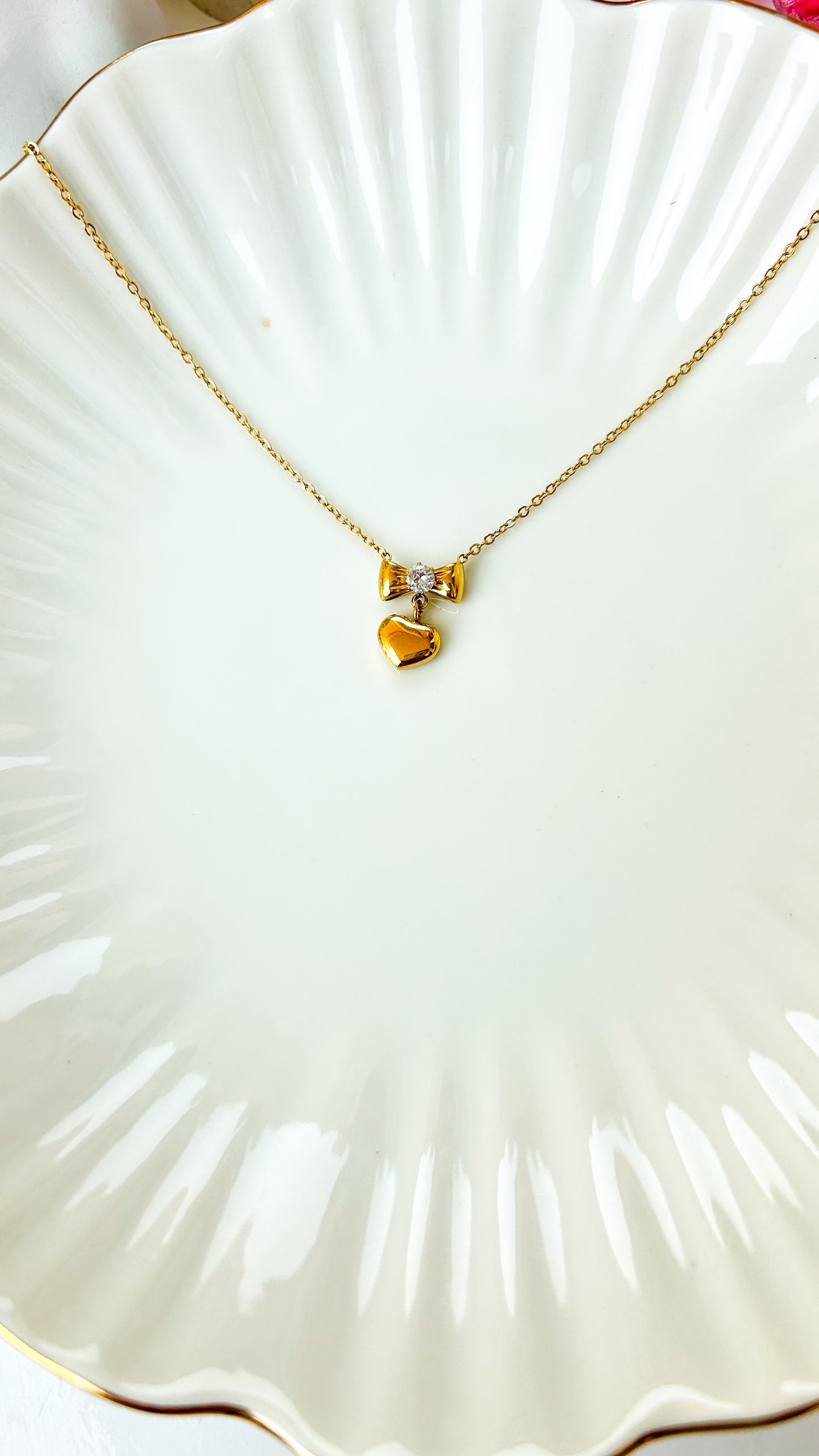 Studded bow heart necklace