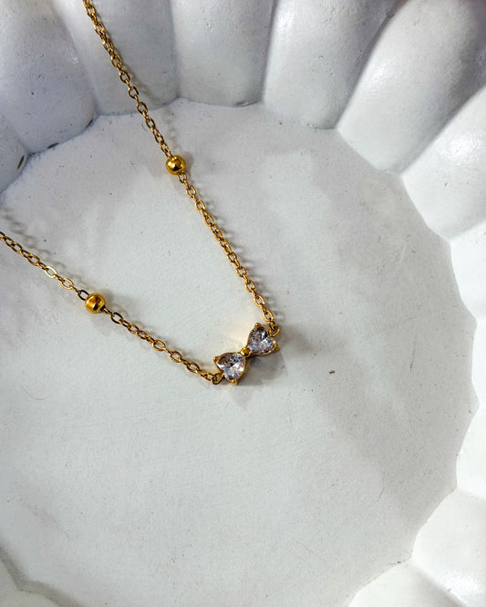 Mini studded bow necklace