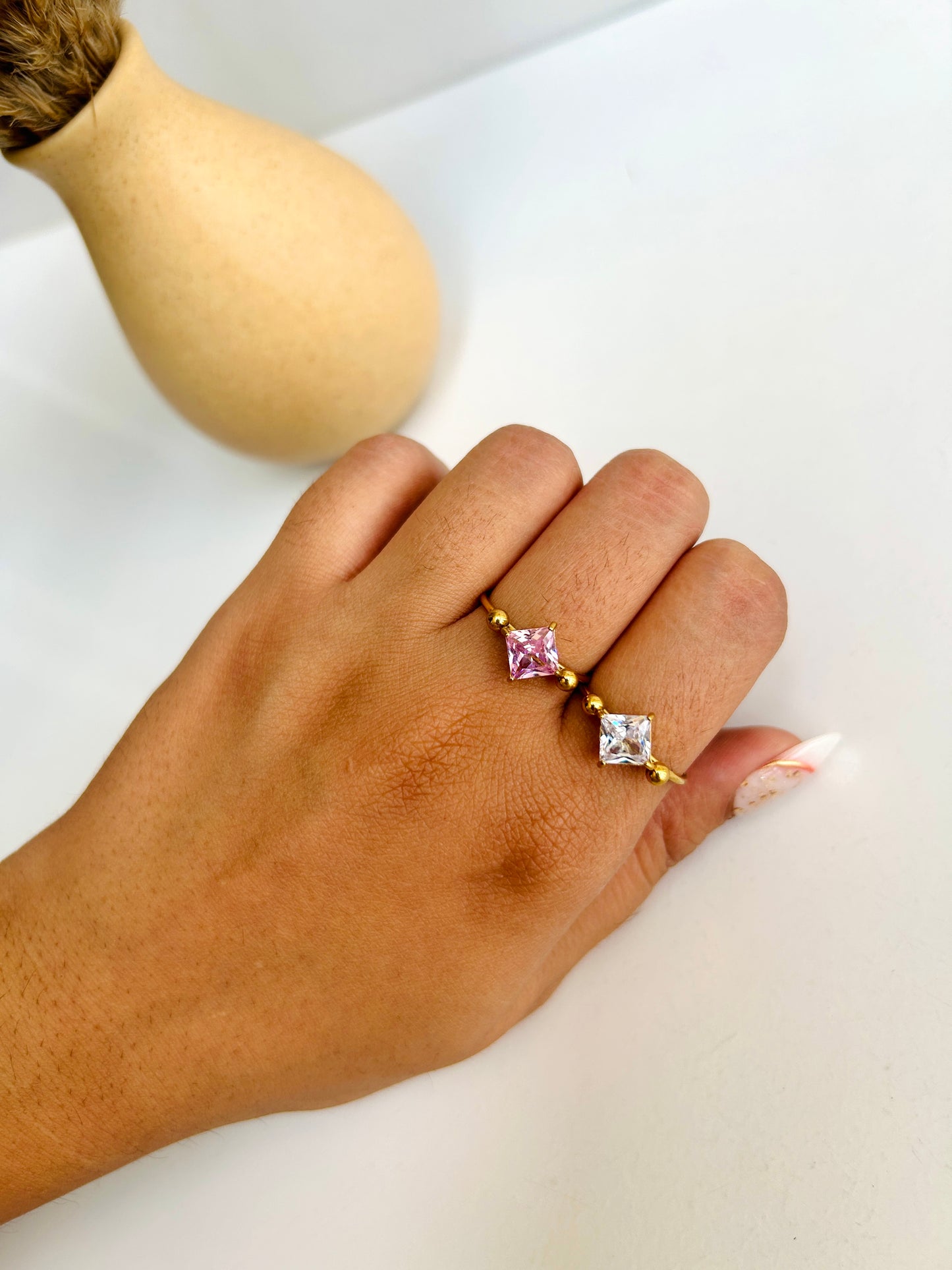 Square stone, adjustable ring