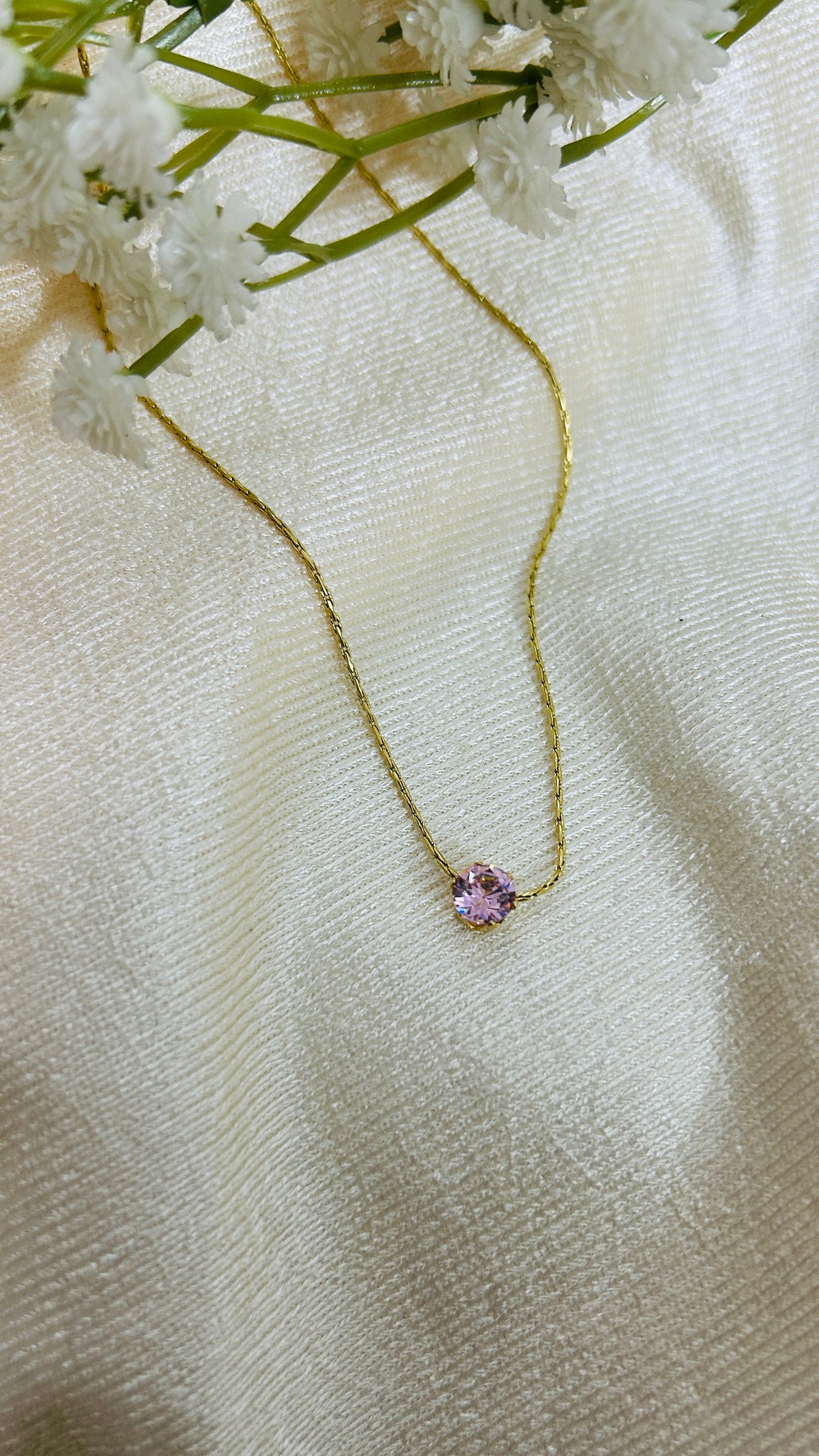Pink solitaire necklace