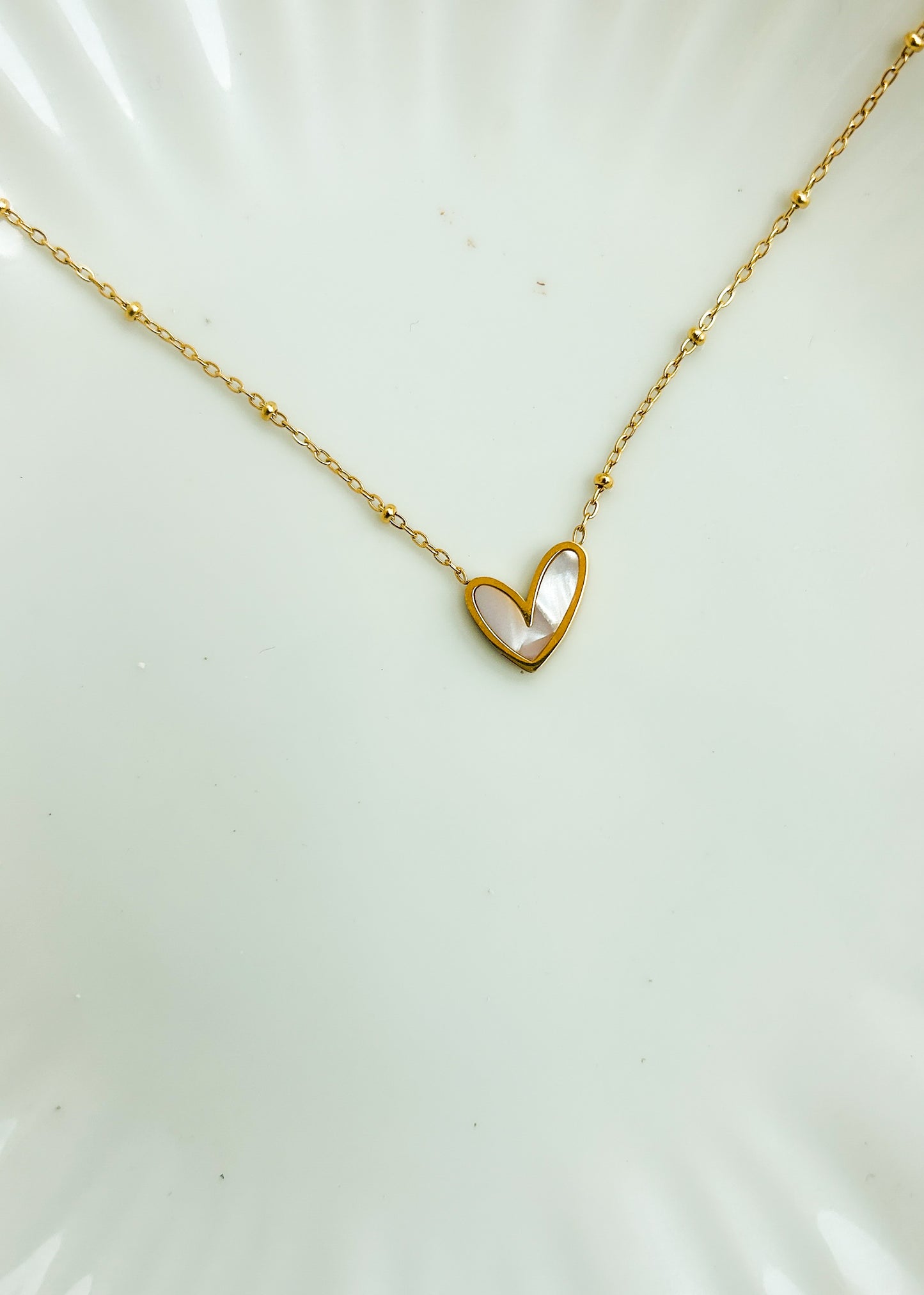 Delicate white heart necklace
