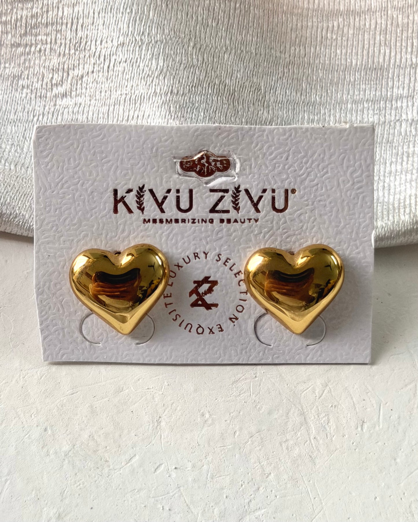 Heart statement earrings