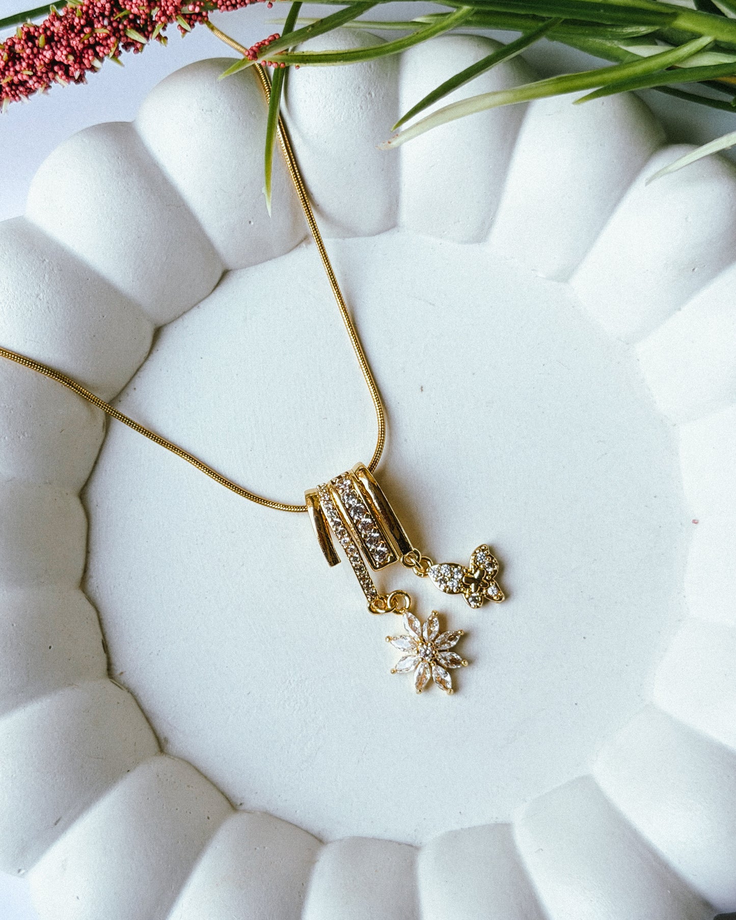 Floral butterfly charm necklace