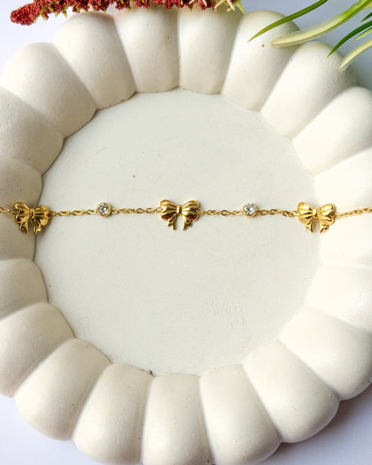 Bow with round stone bracelet