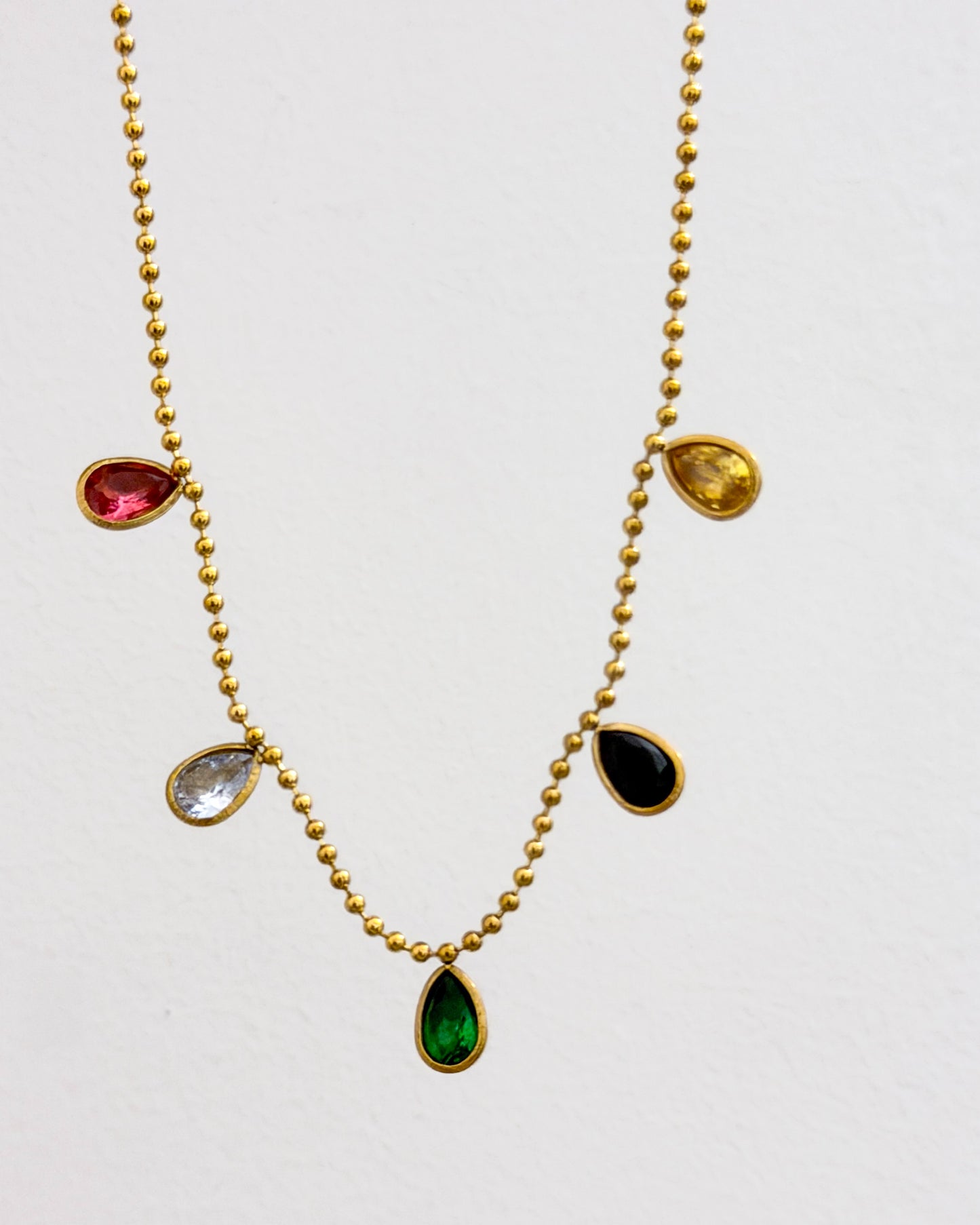 Drop stone necklace with studs