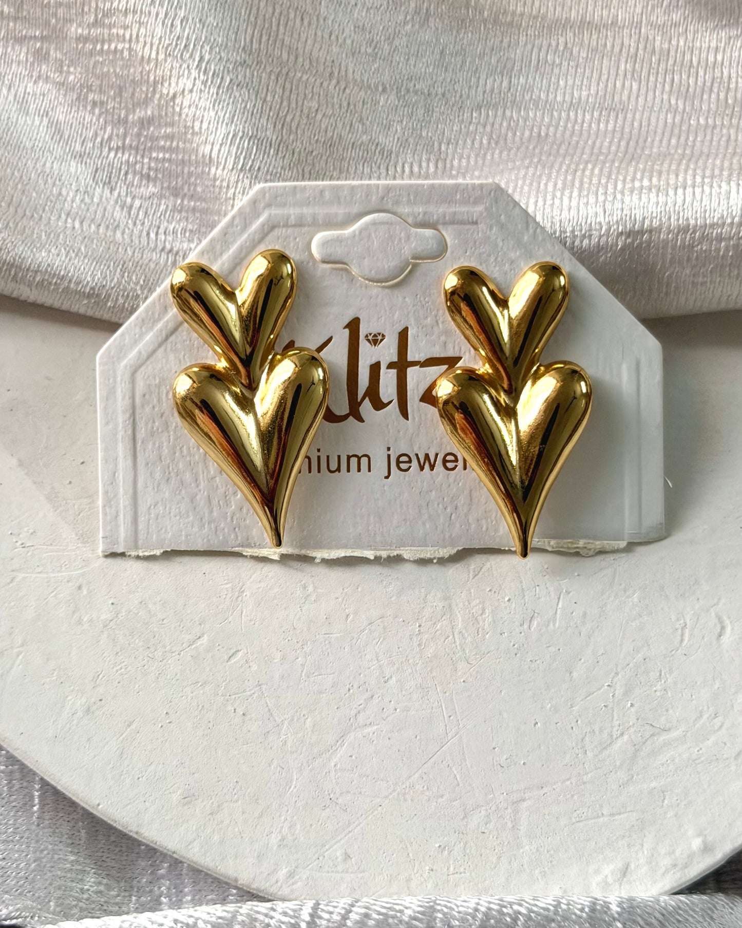 Pointed heart statement earring