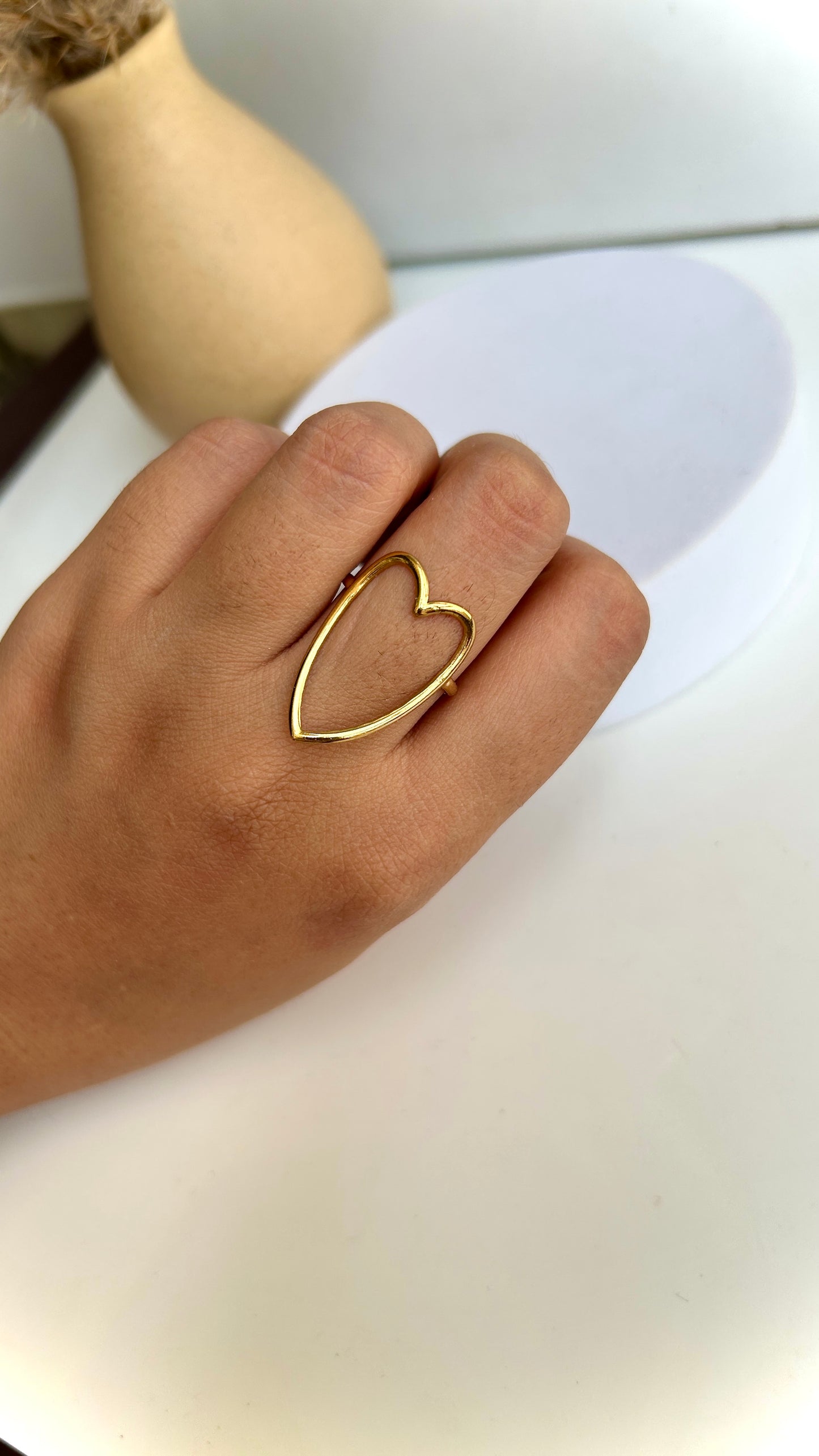 Hollow heart adjustable ring