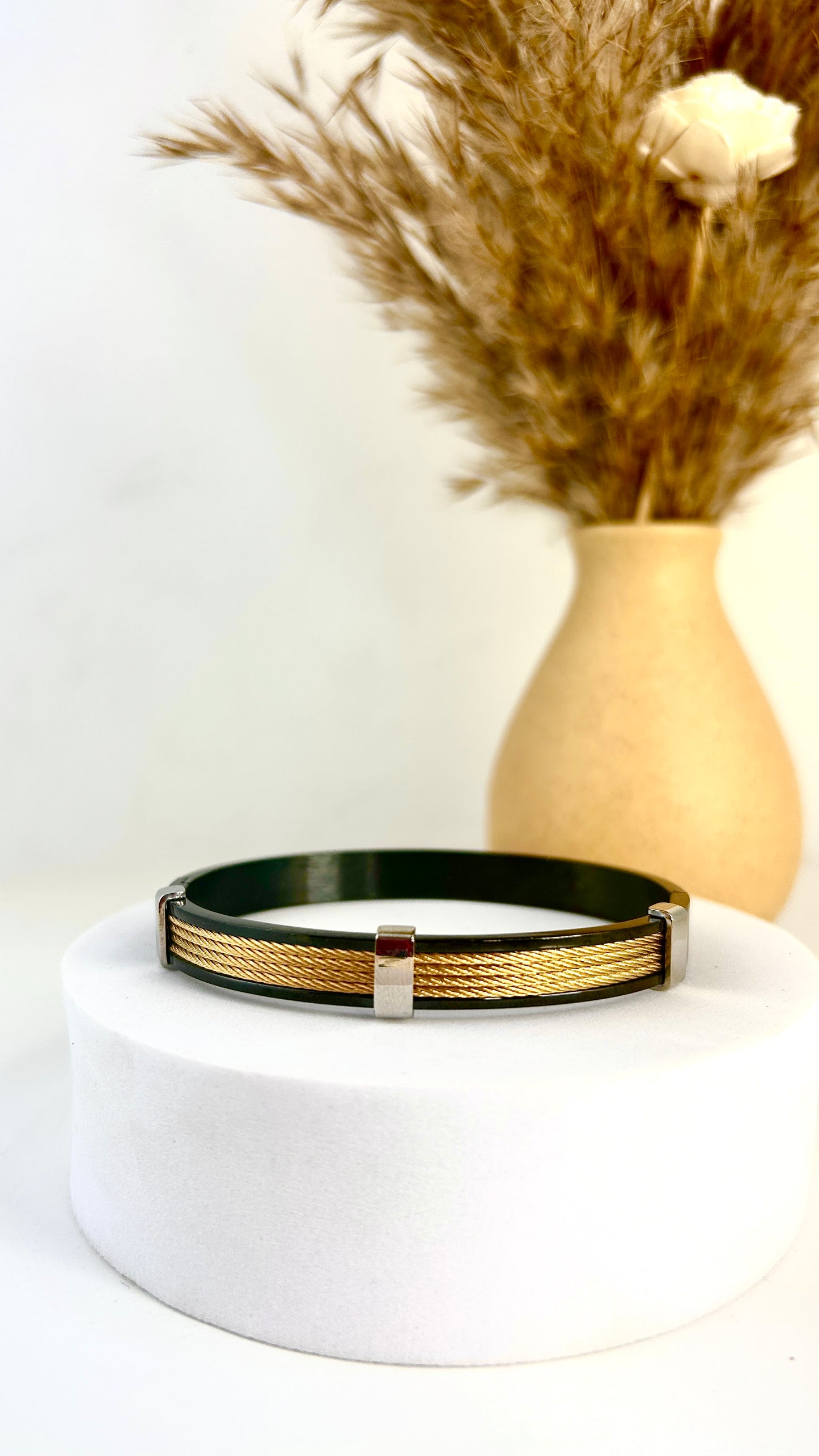 Black metal gold tone men bracelet