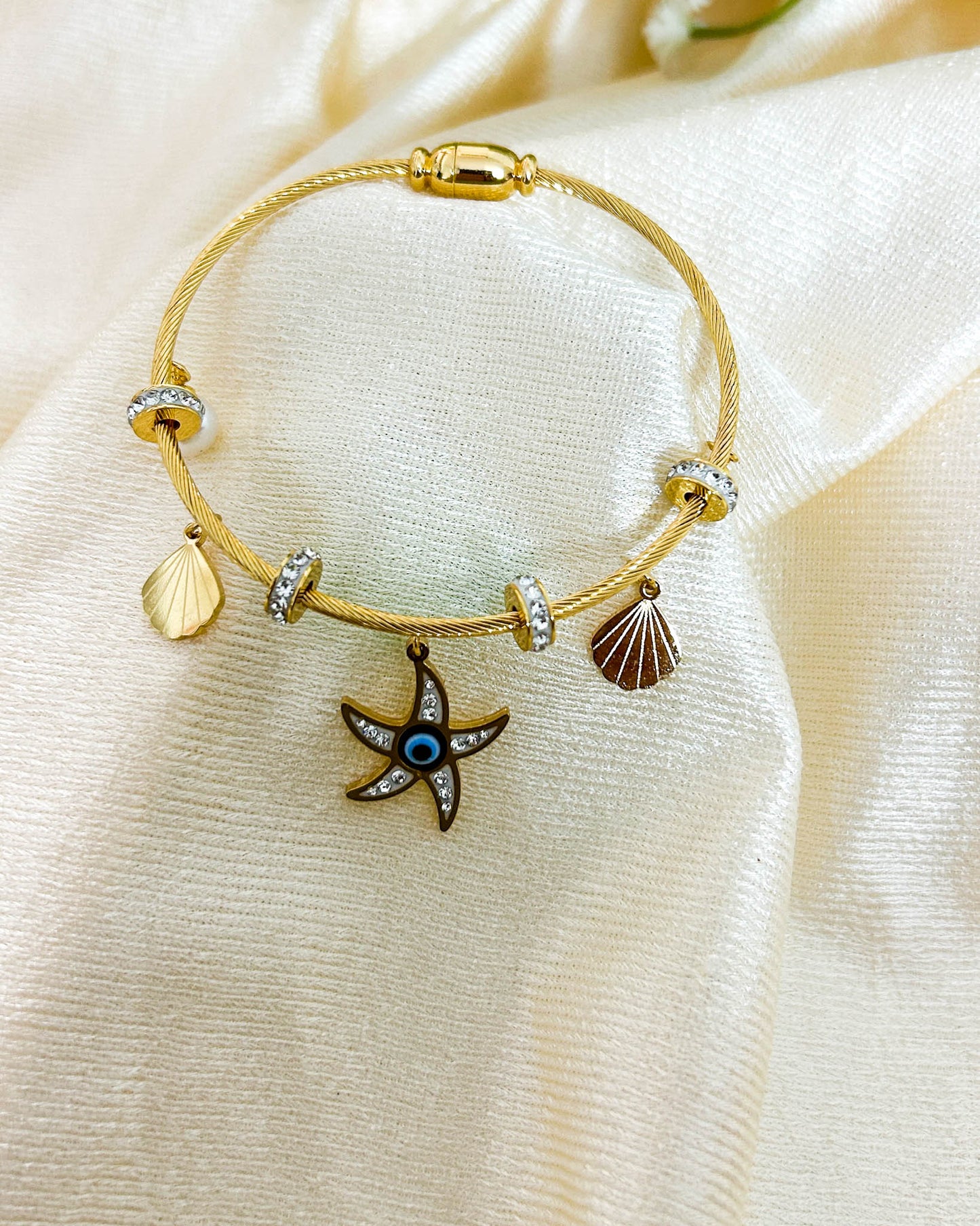 Evil eye starfish charm bracelet