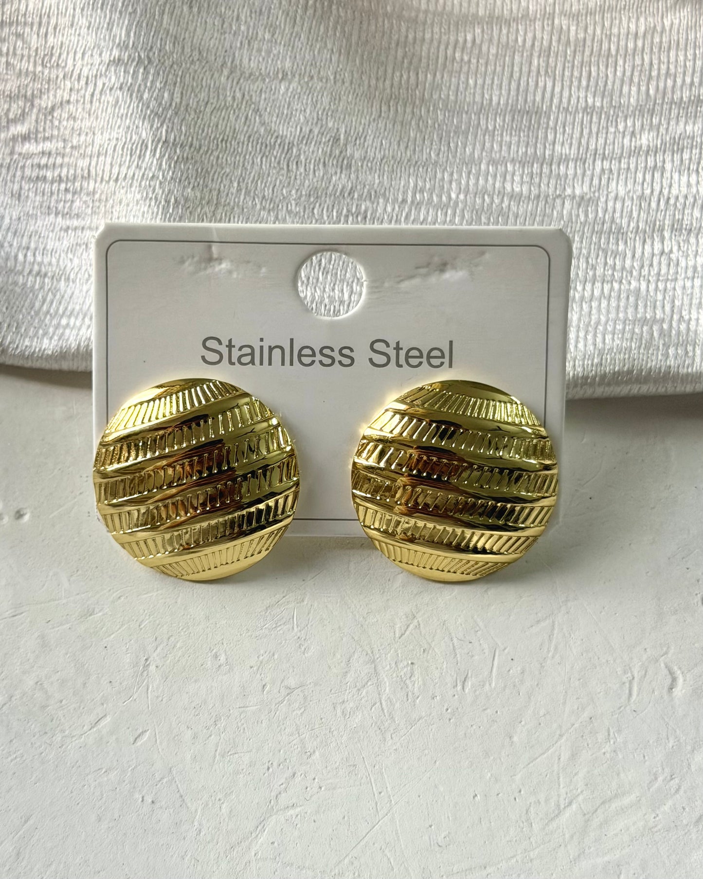 Round statement earrings