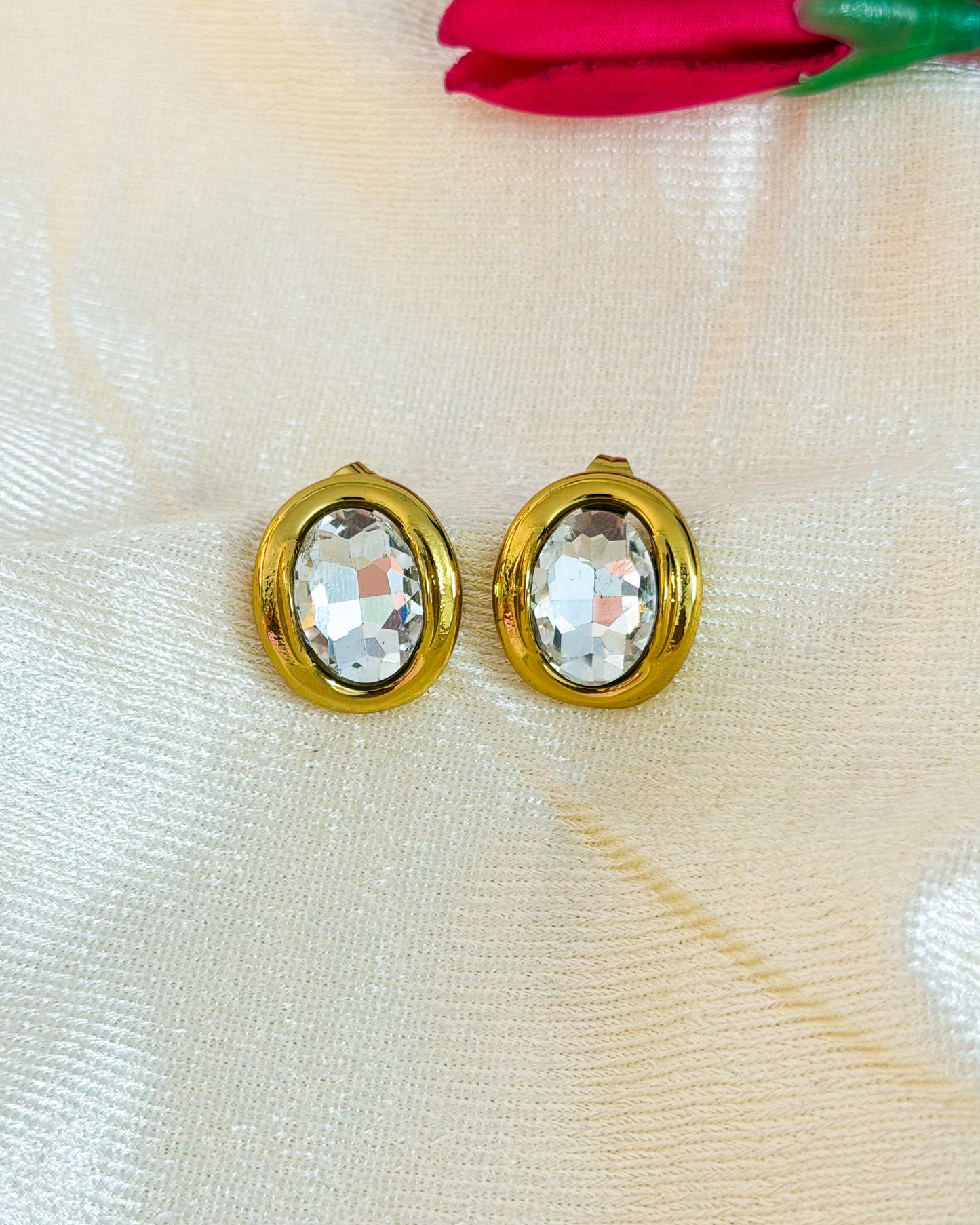 White oval earrings