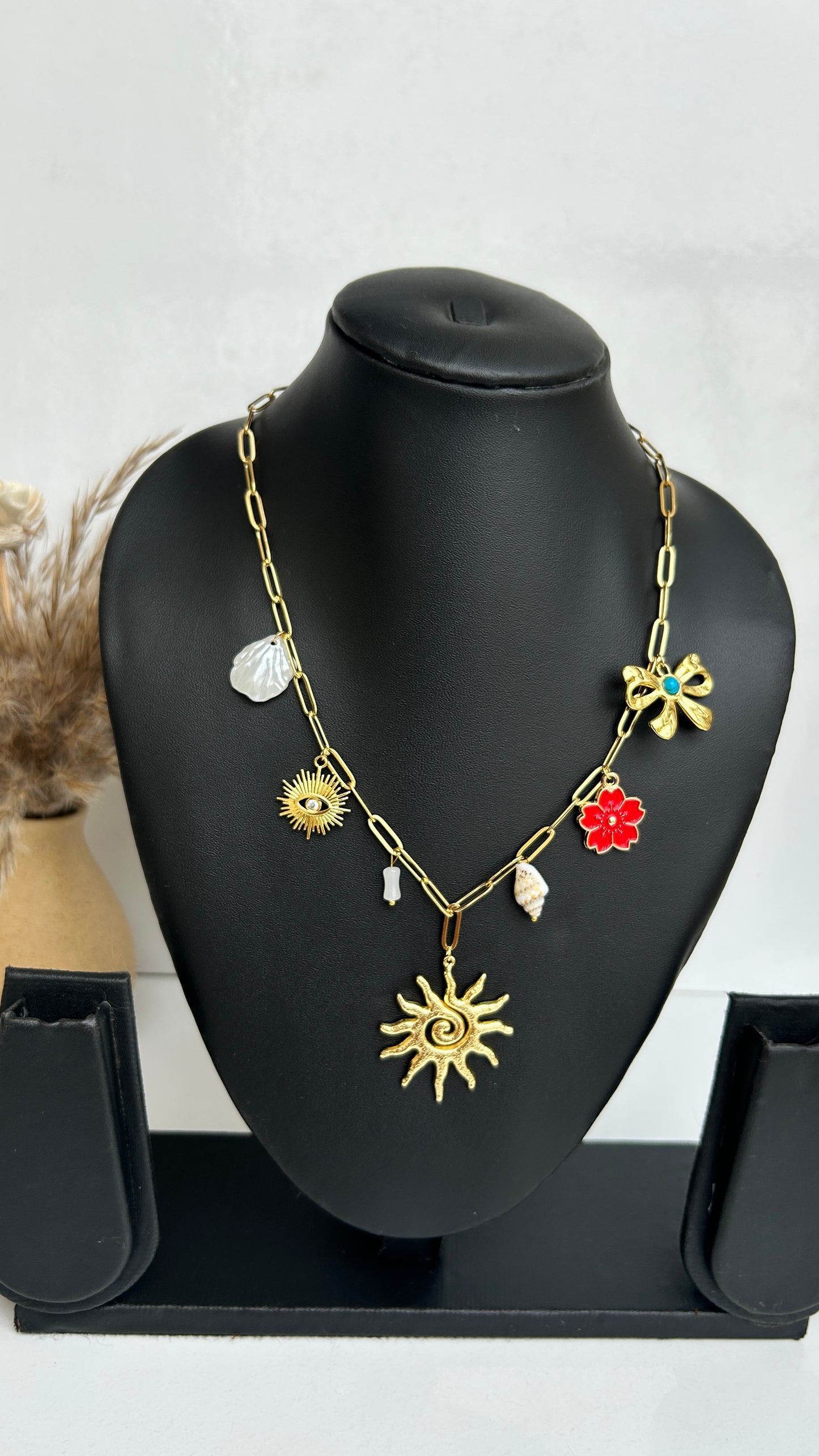 The AURA charm necklace