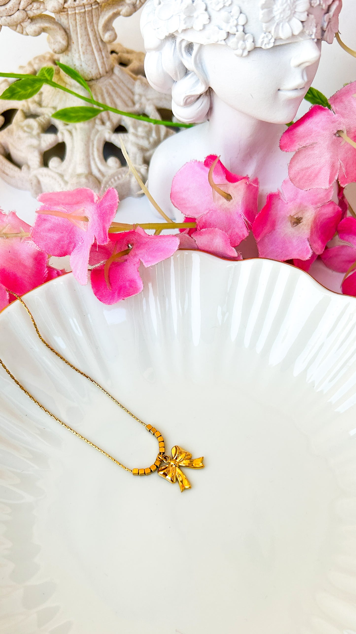 Beaded bow necklace