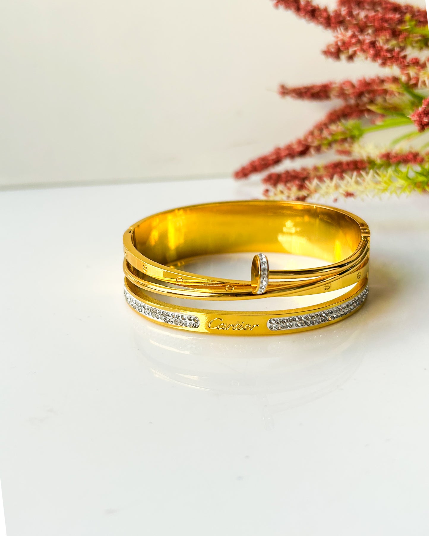 Nail + cartier chunky bracelet