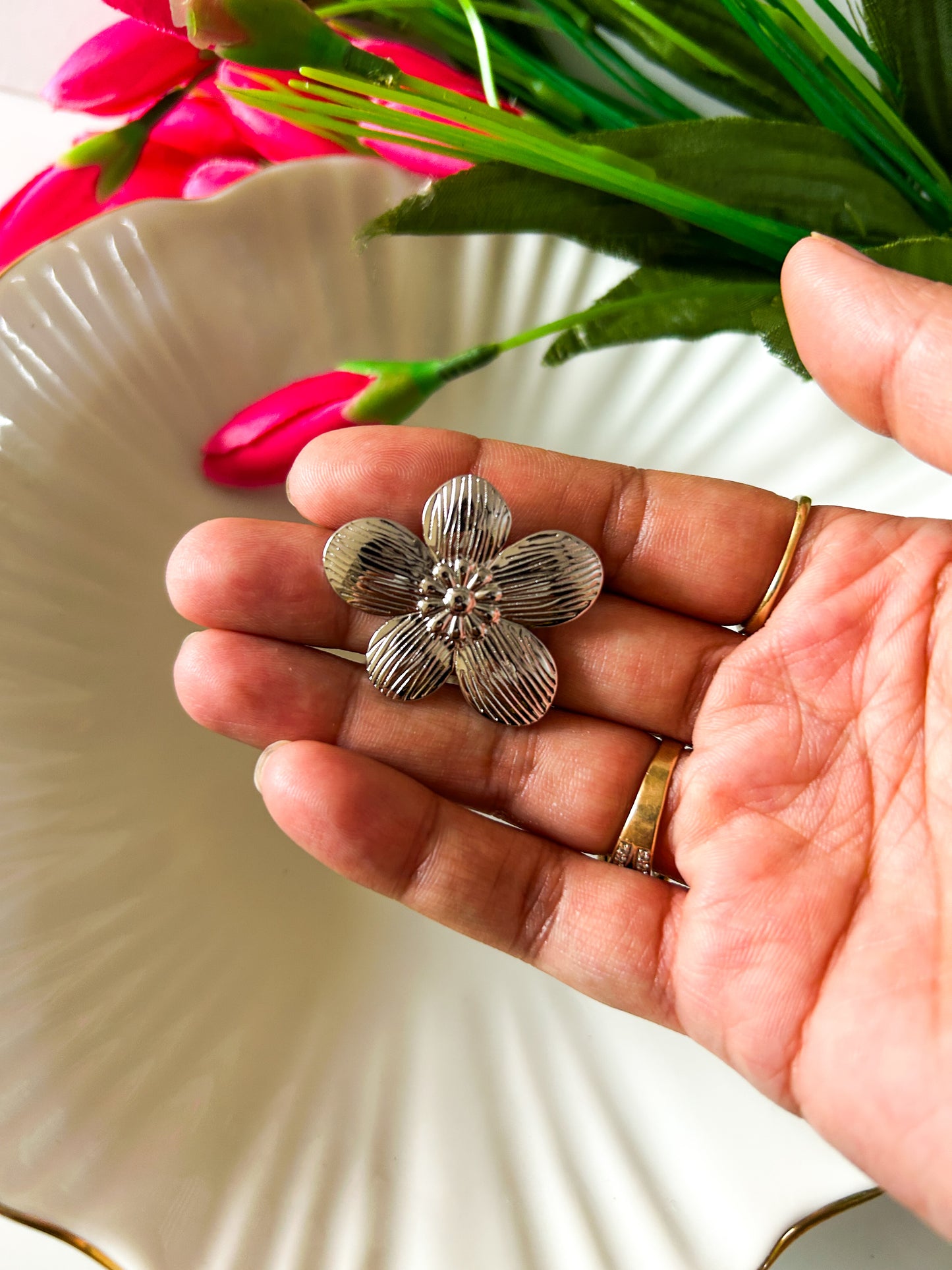 Silver floral studs