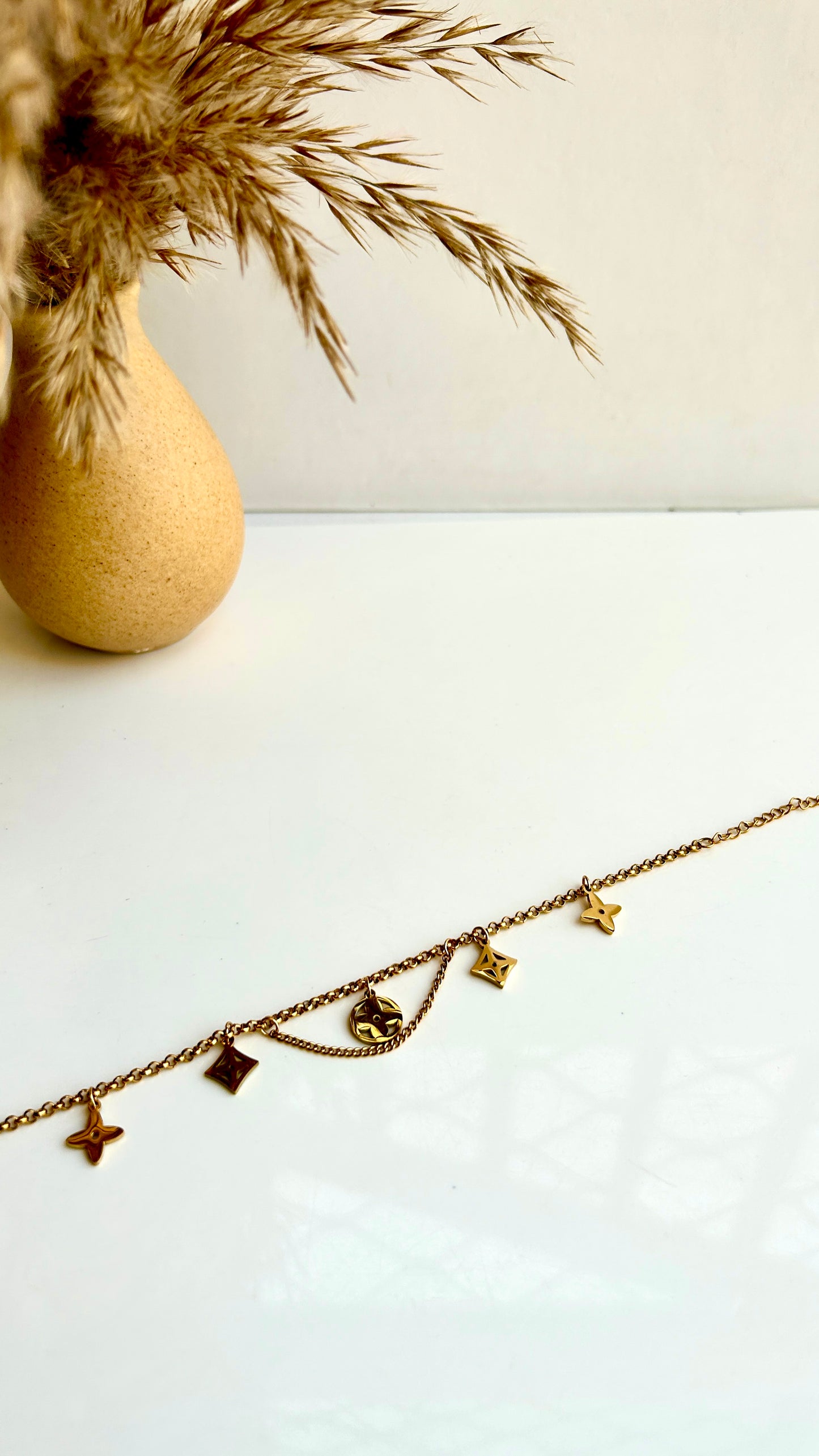 Brand inspired charm bracelet