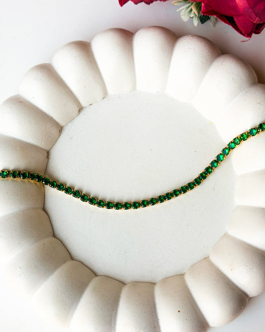 Green round stone tennis bracelet