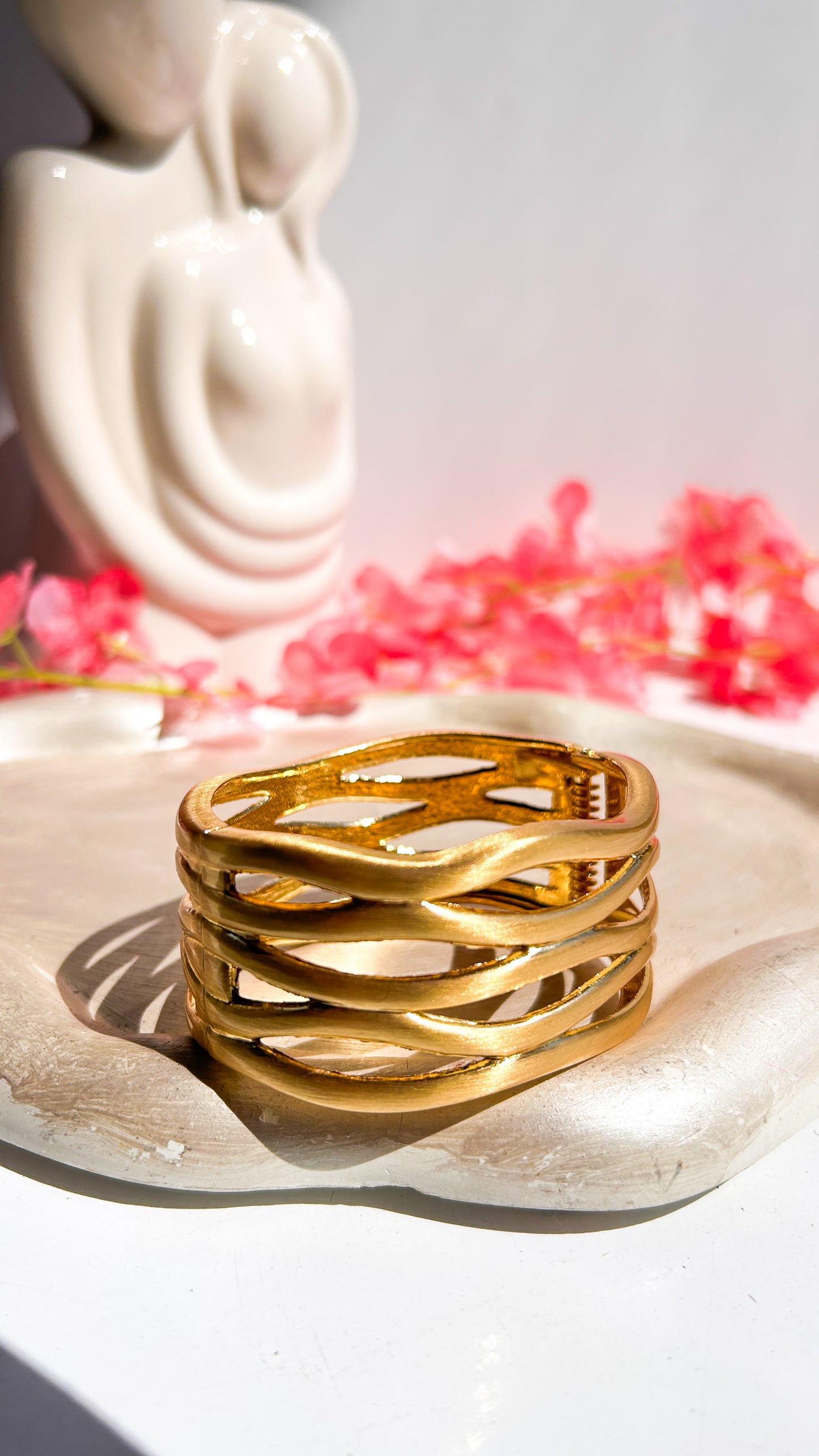 Chunky hollow cutout cuff with frosted metallic shine