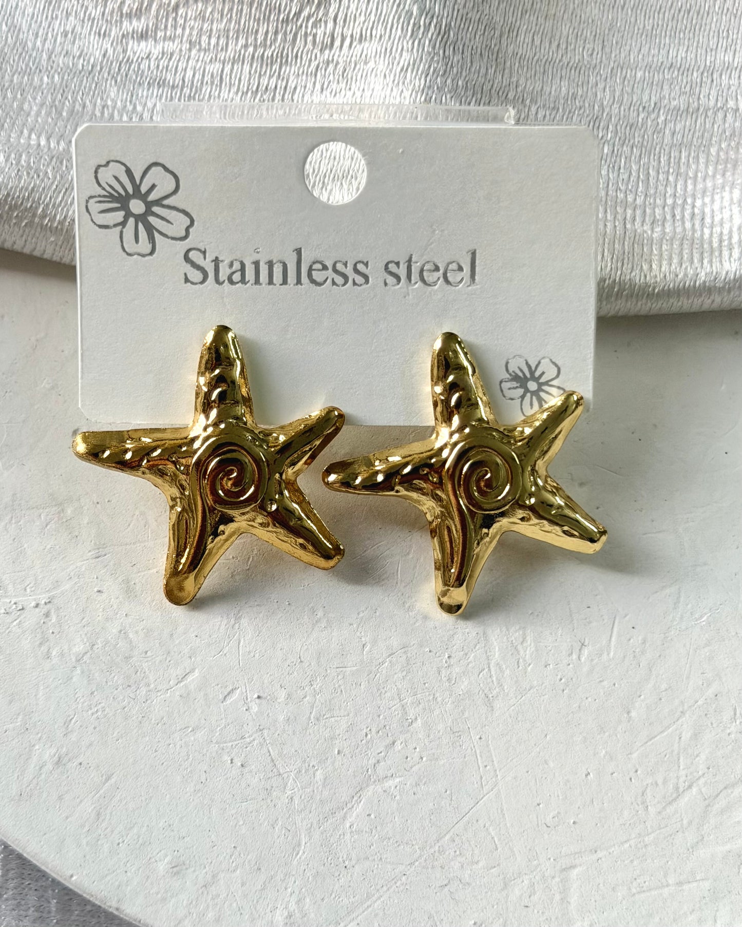 Star statement earrings