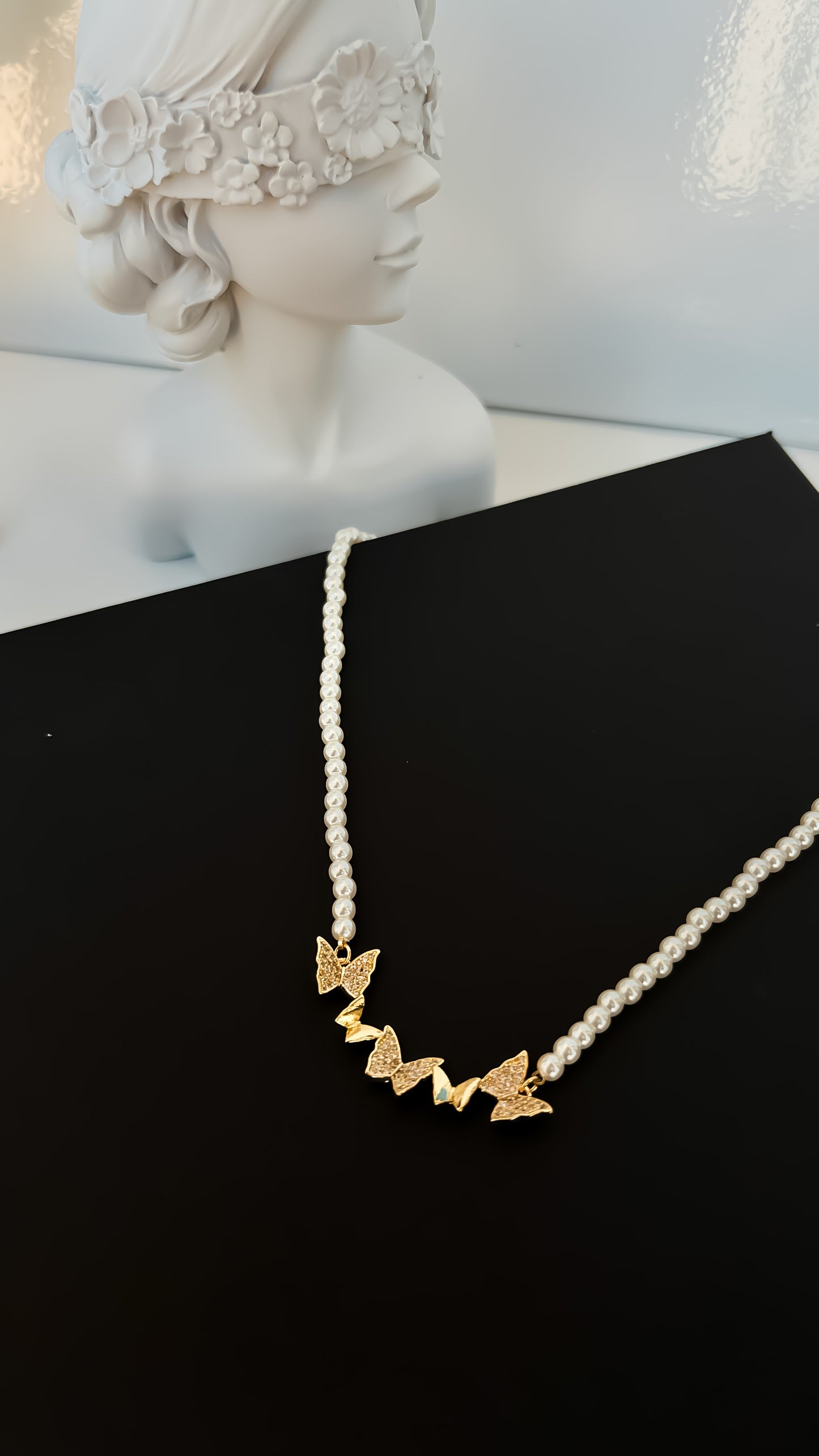 Butterfly 20. Pearl necklace