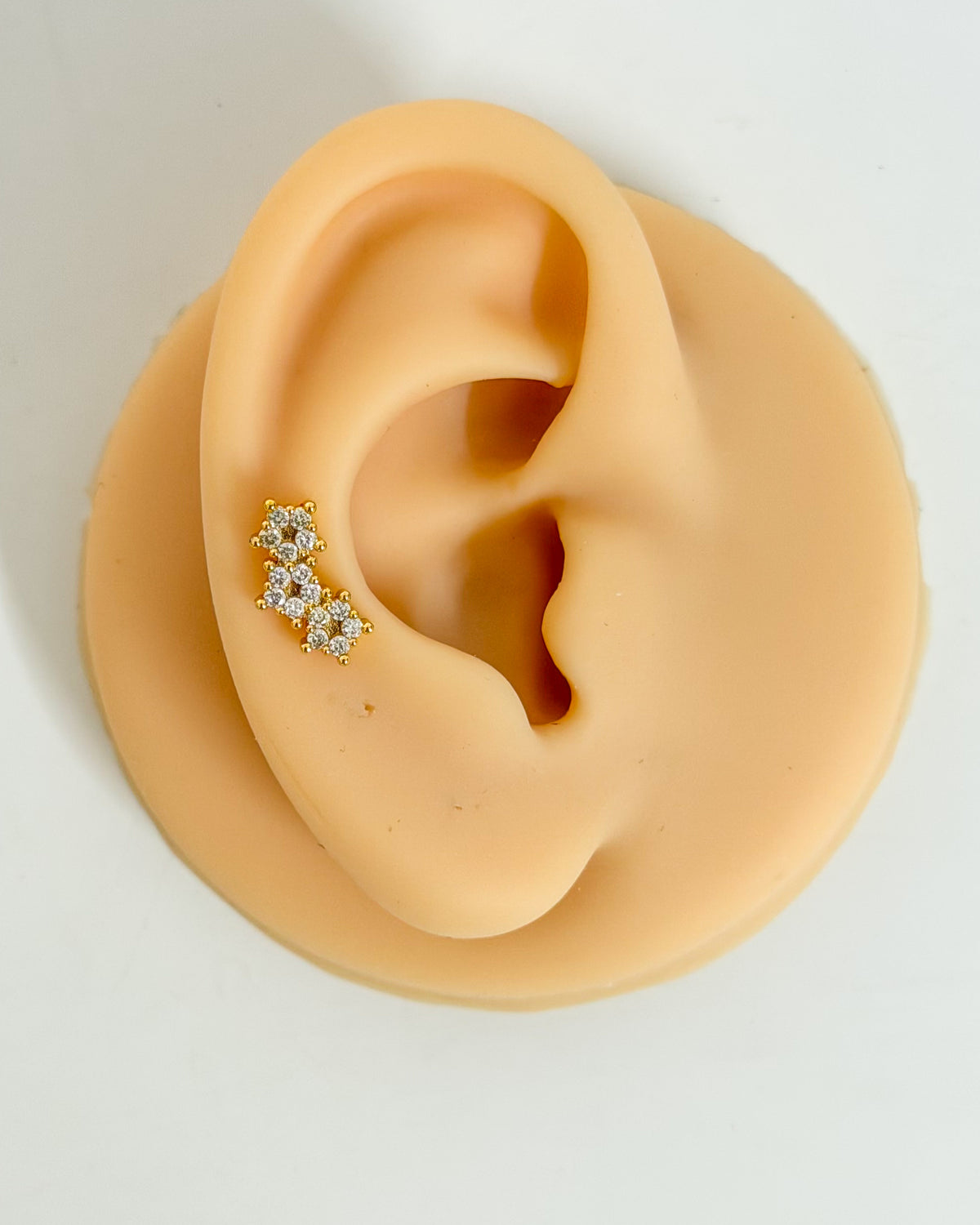 Three designer flower ball back studs