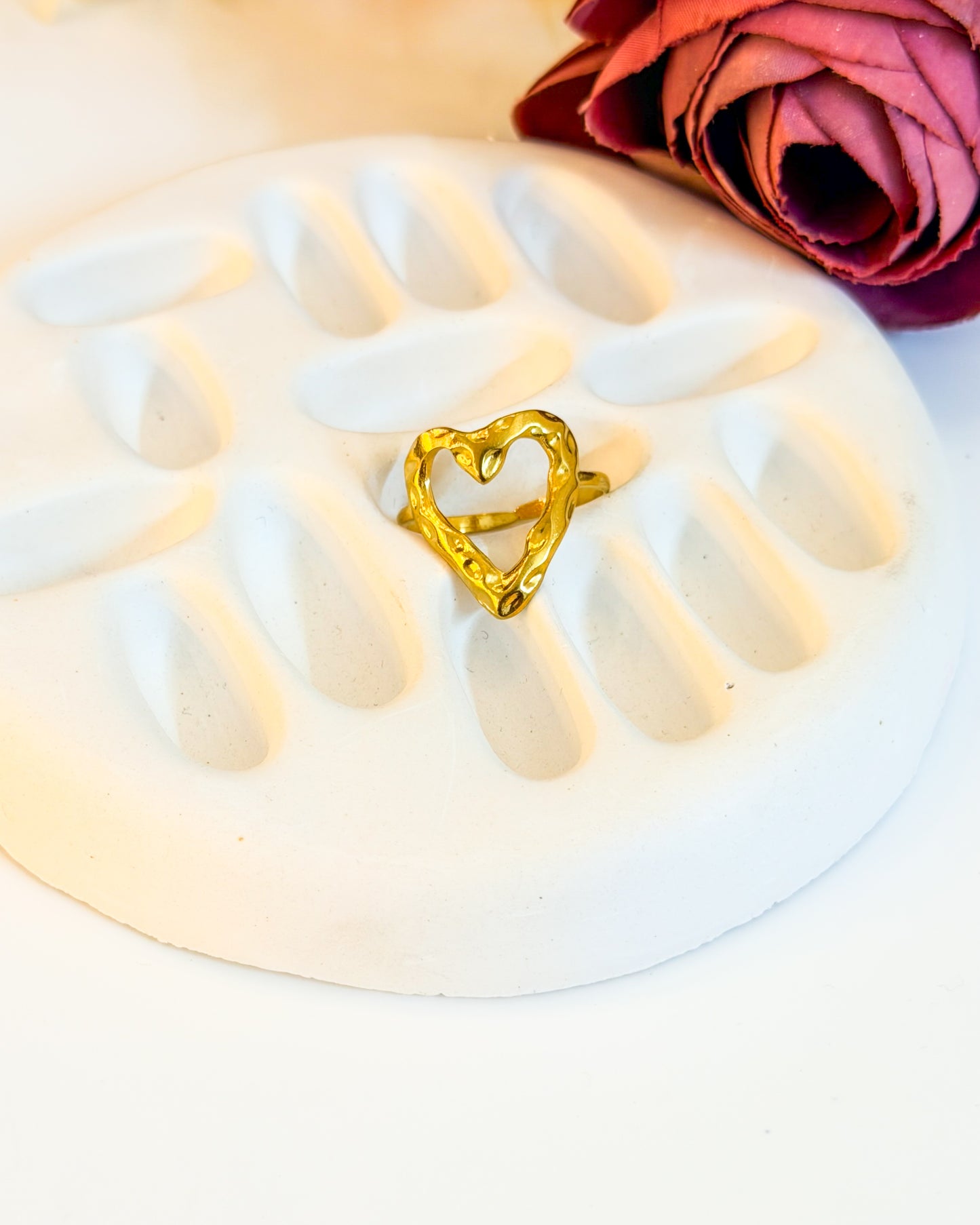 Hollow heart adjustable ring