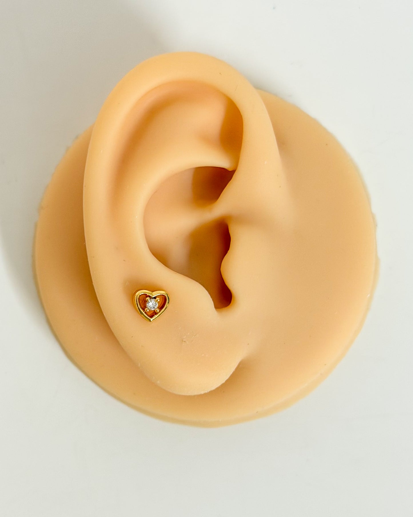 Solitaire in a heart ball back studs