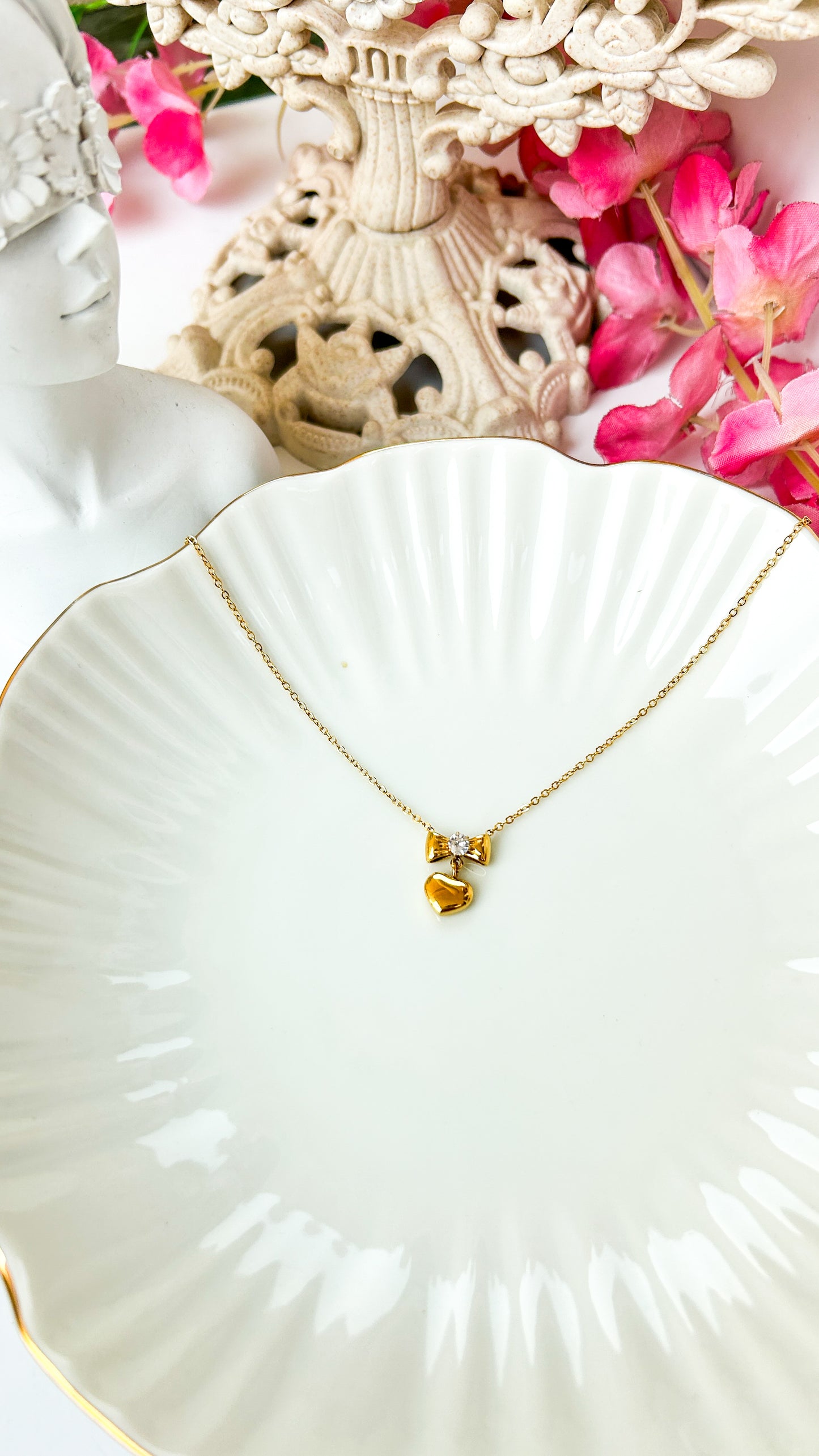 Studded bow heart necklace