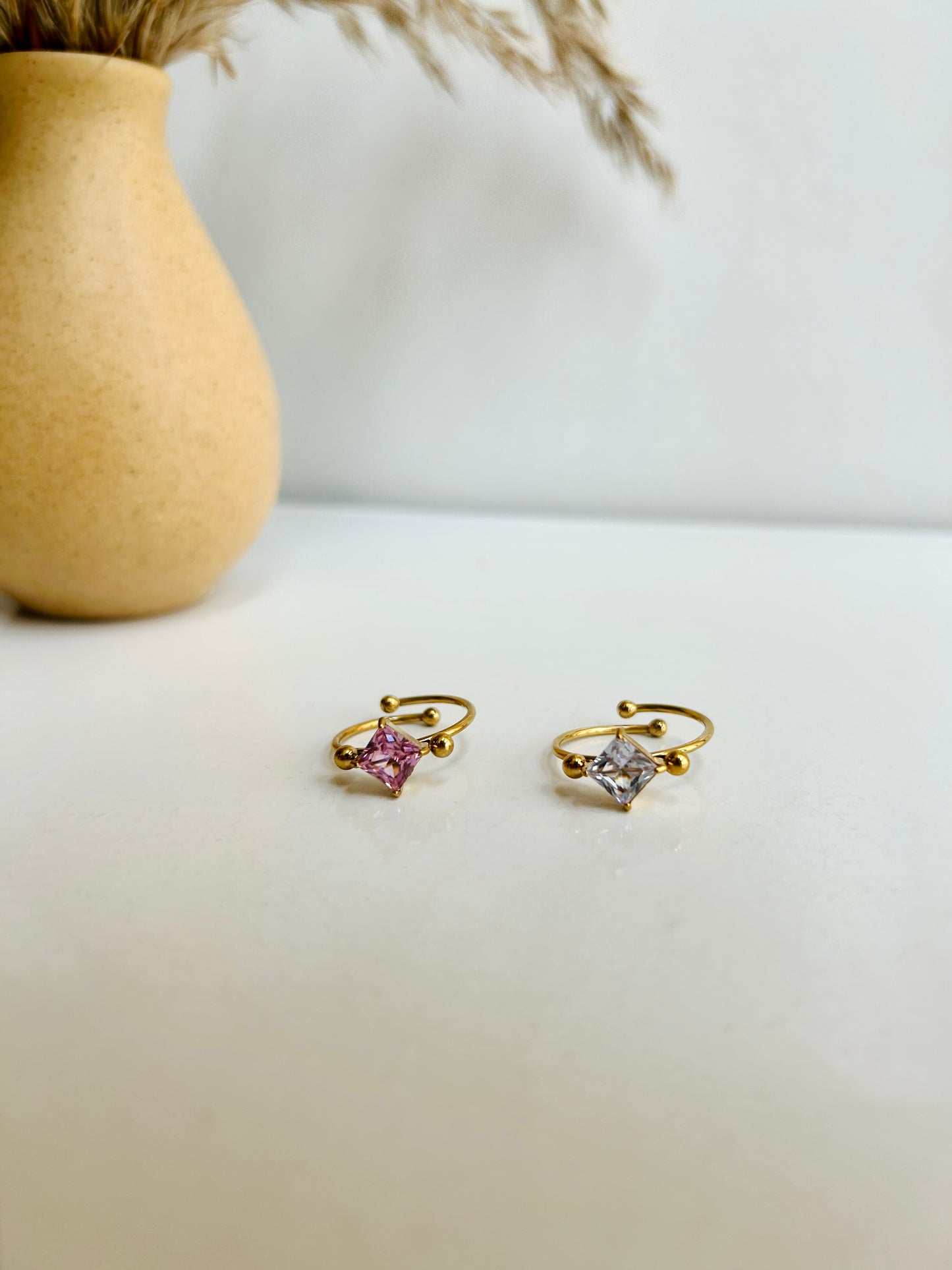 Square stone, adjustable ring
