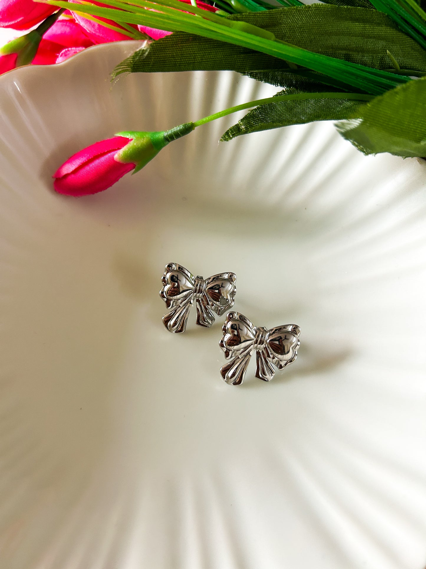 Silver bow studs