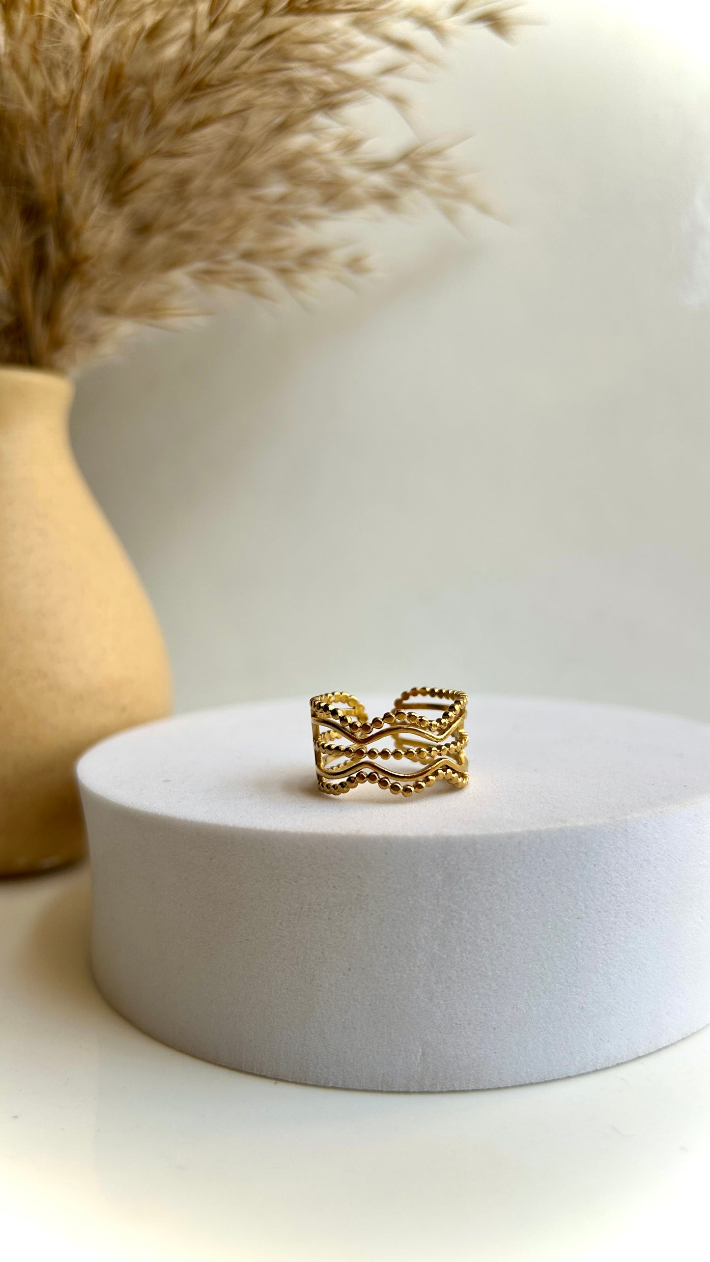Layered adjustable ring