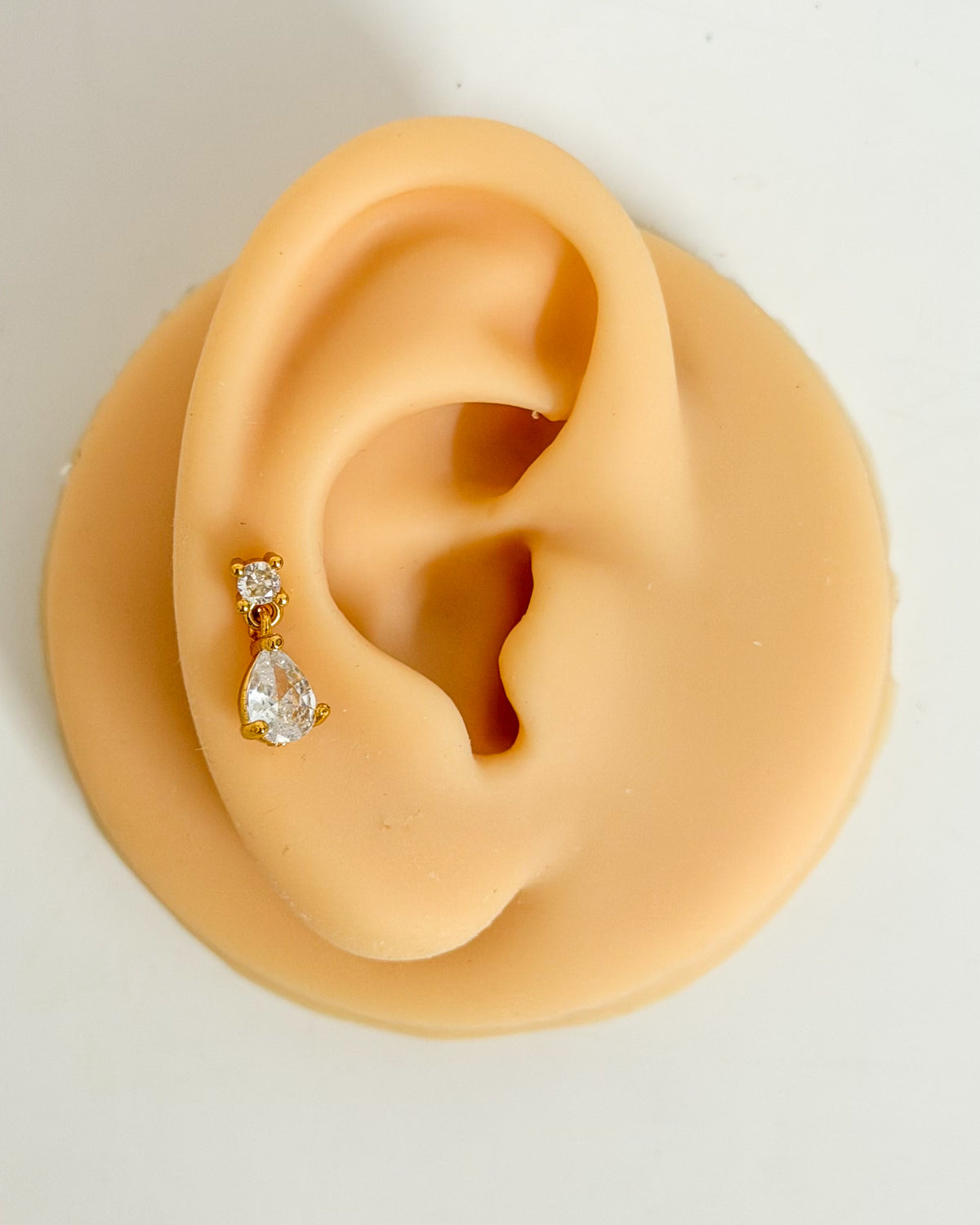 Drop hanging ballback studs