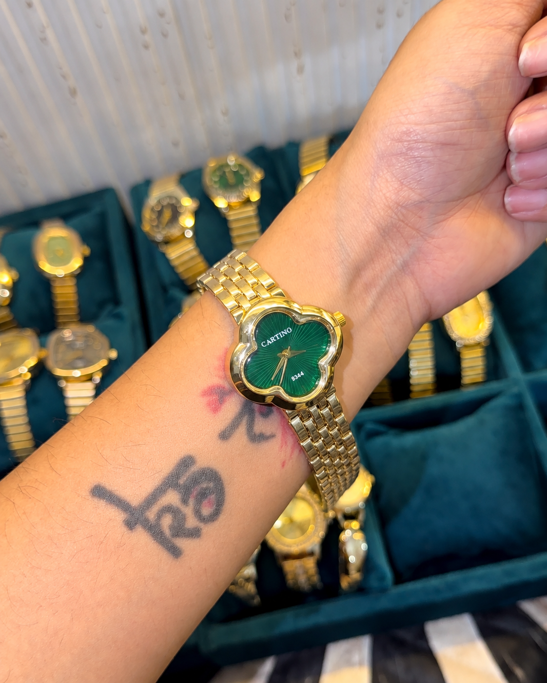 Green dial clover watch