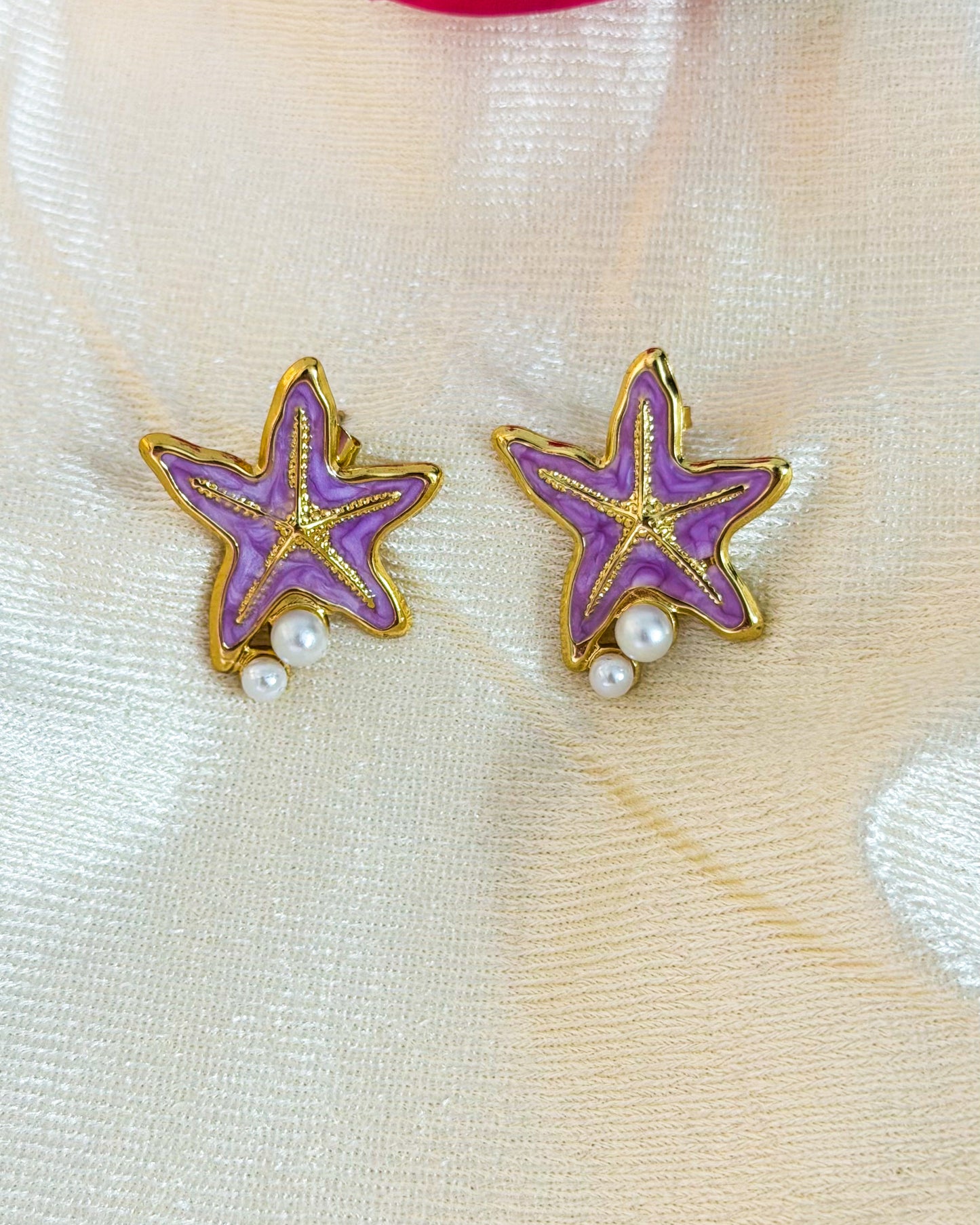 Purple starfish enamel earrings