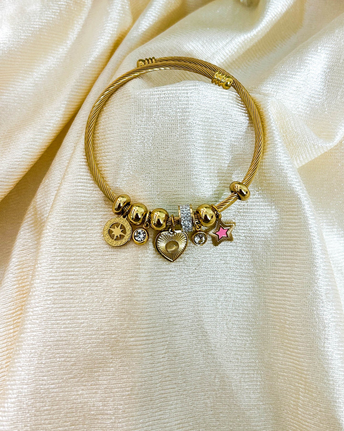 Pink star charm bracelet