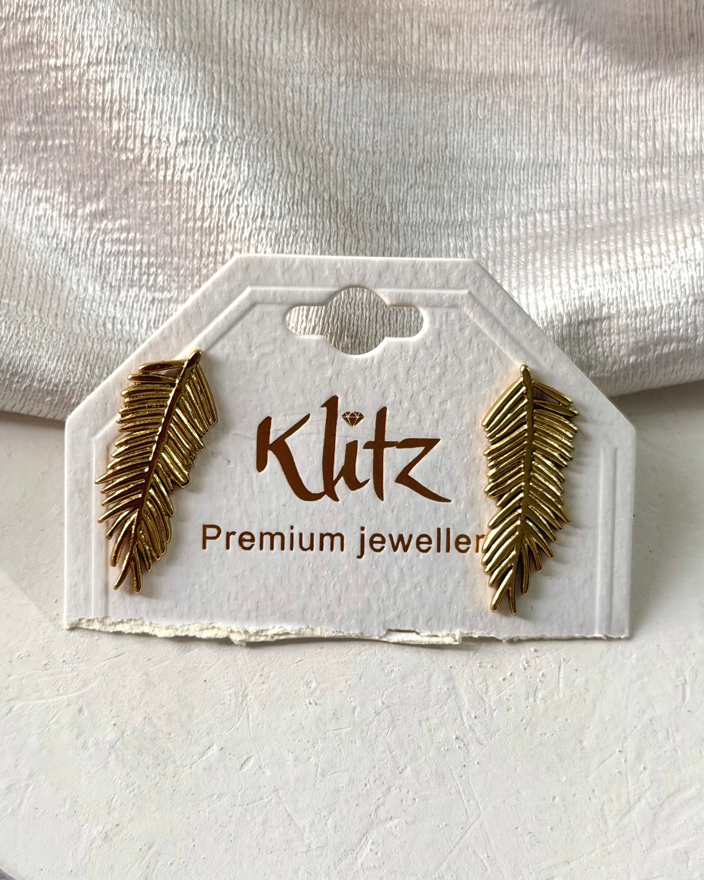 Wing statement earrings