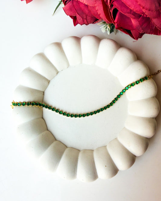 Green round stone tennis bracelet