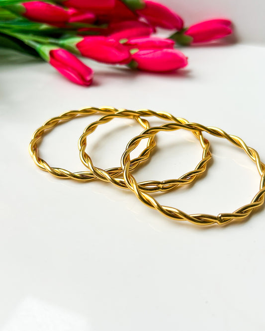 Twisted set of 3 thin wrist bangles ( size 2)