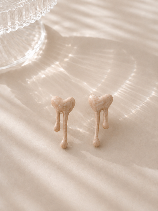 White molten heart statement, earring ￼￼