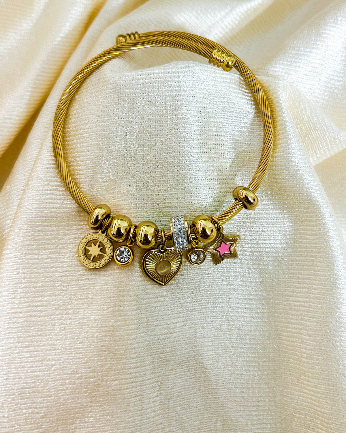 Pink star charm bracelet