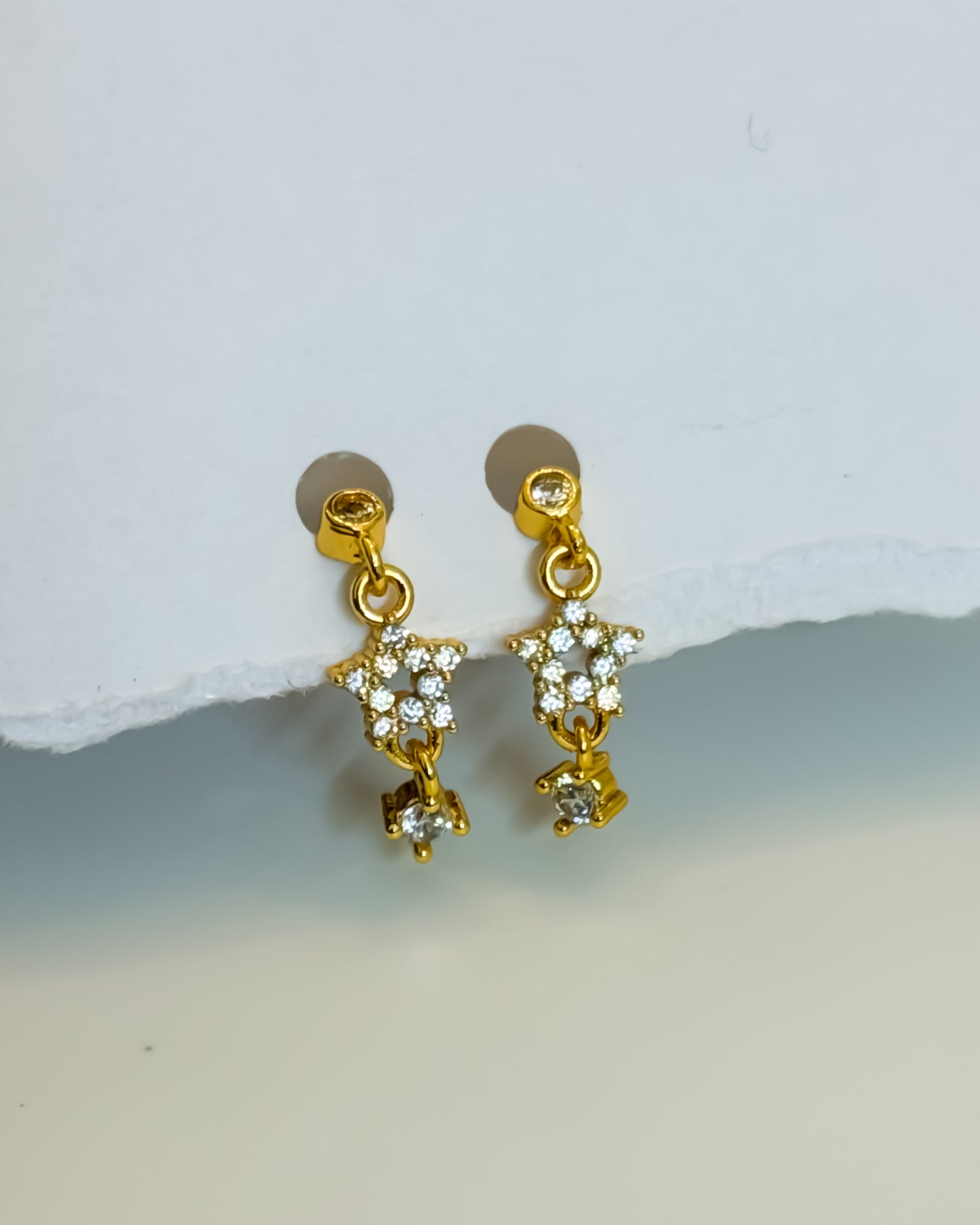 Hanging star ball back earrings