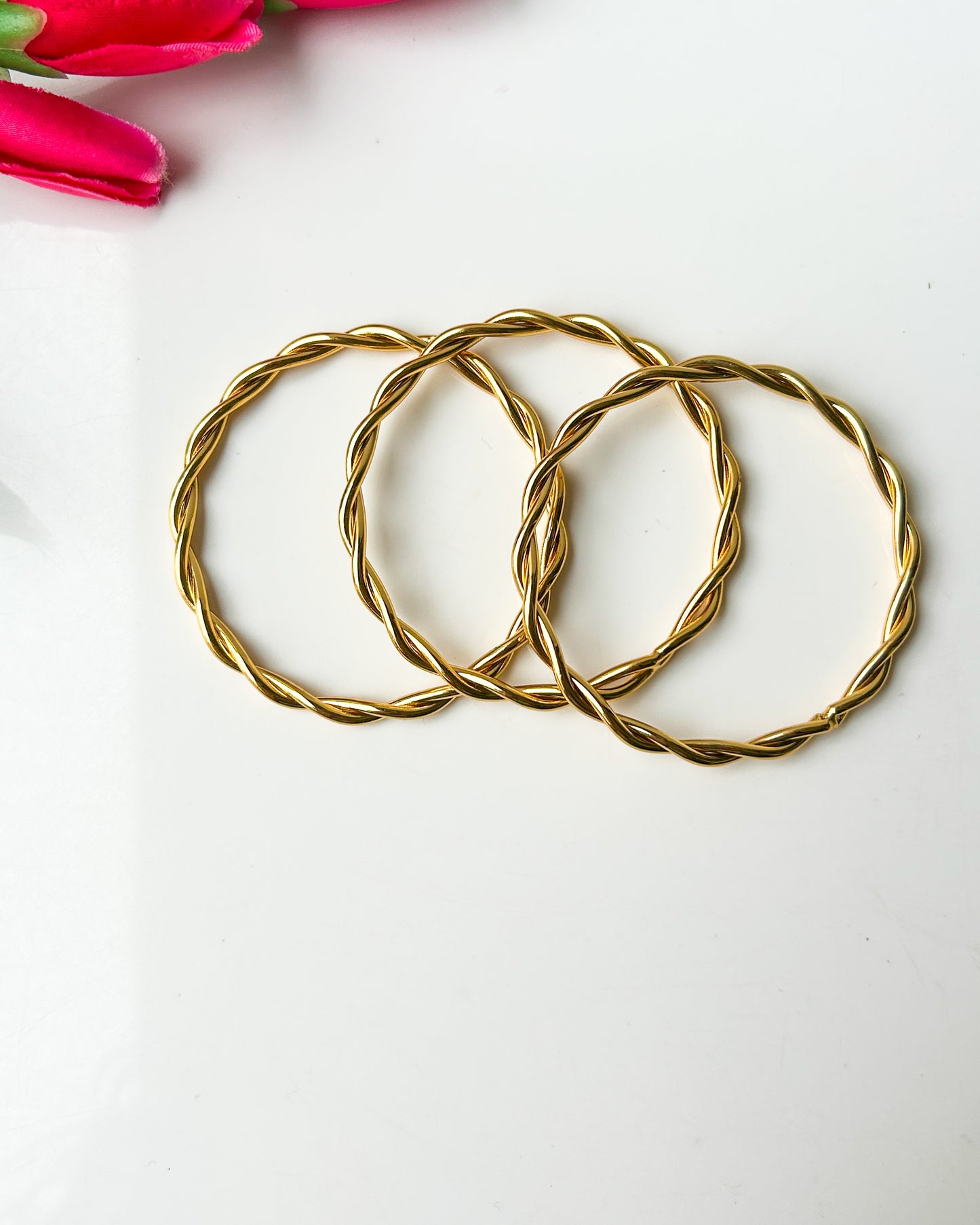 Twisted set of 3 thin wrist bangles ( size 2)