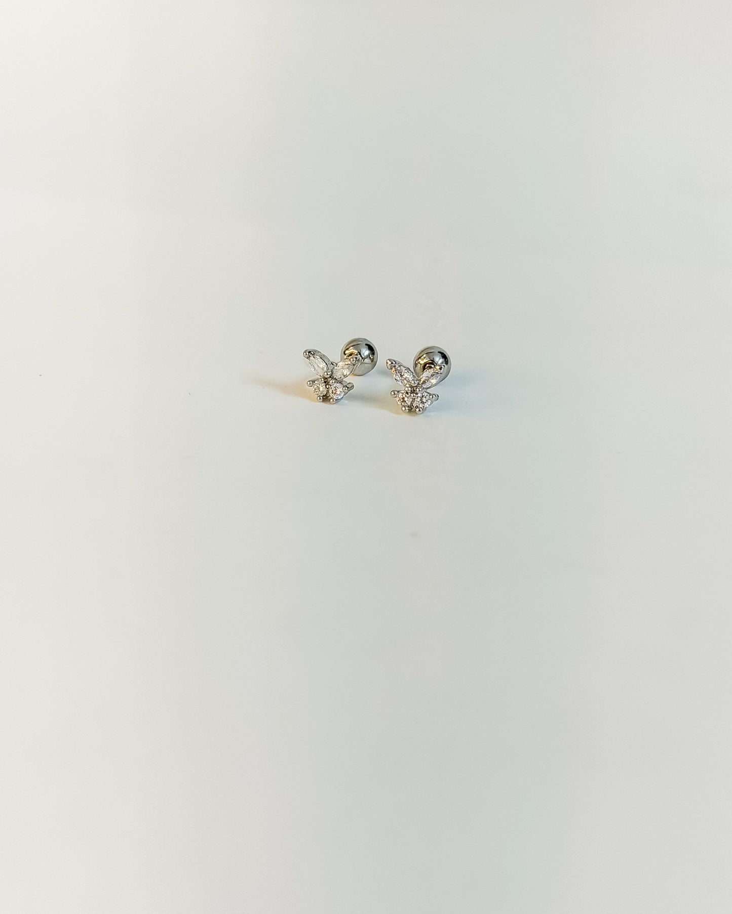Mini butterfly silver ball back earrings