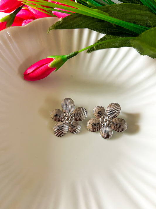 Silver floral studs