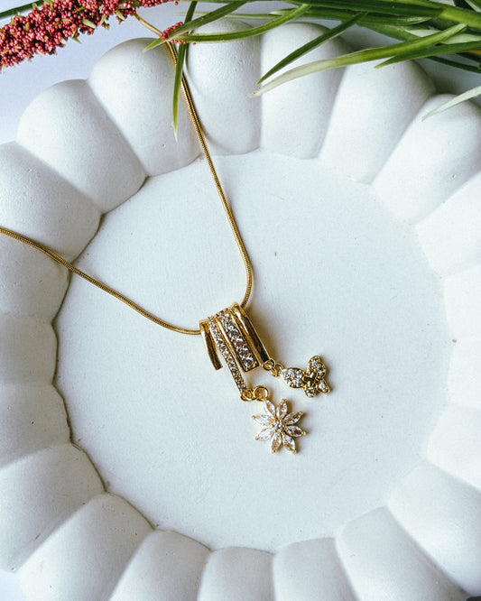 Floral butterfly charm necklace
