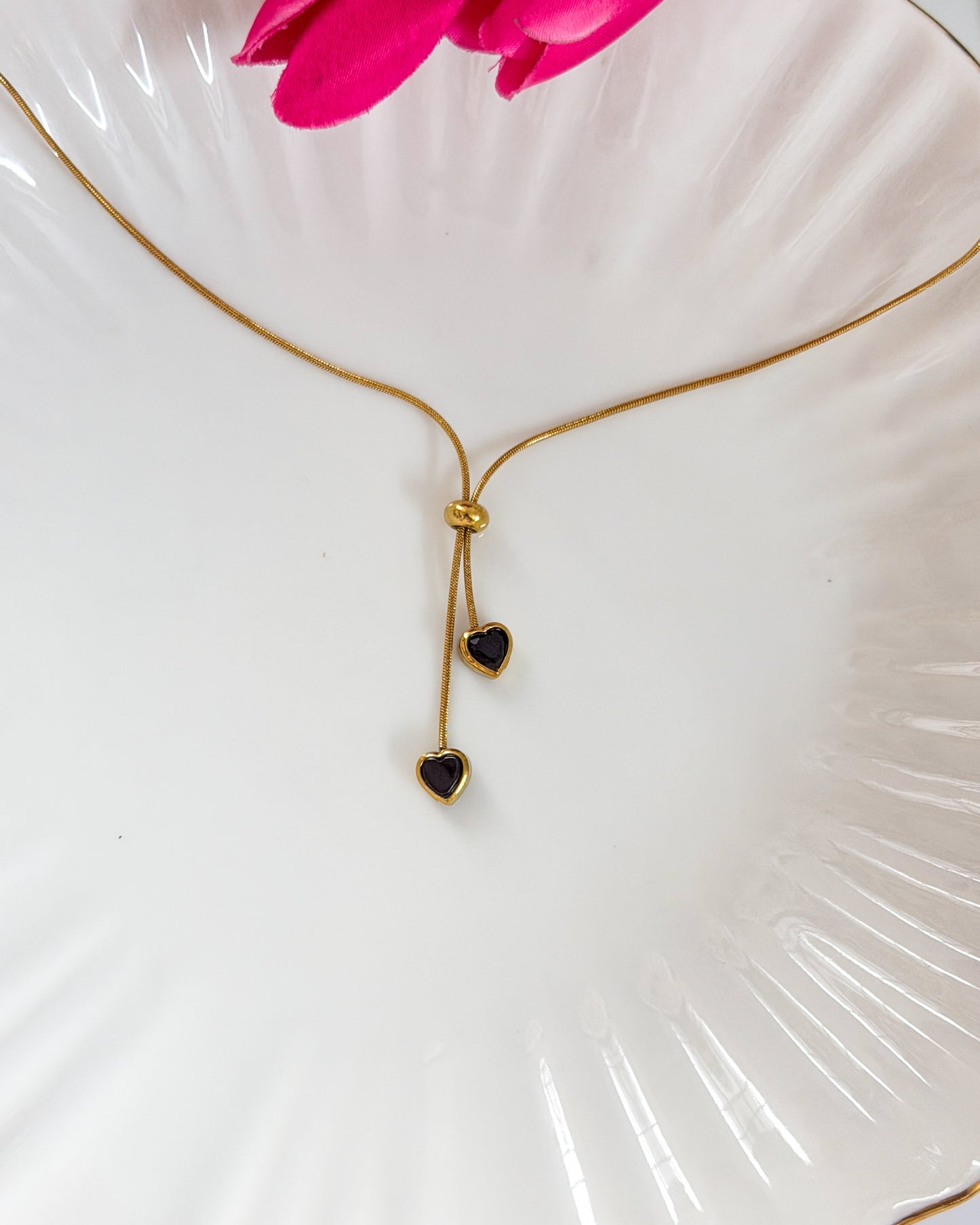 Adjustable black stone hanging necklace