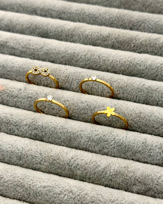 Studded infinity with floral ring set of 4